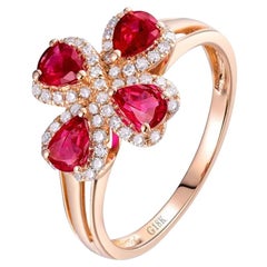 Bague fleur en or rose 18 carats avec diamants et rubis