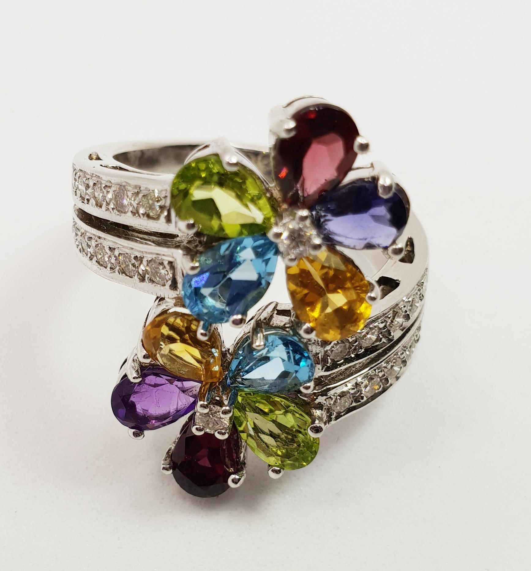 Metal: 18k White Gold
Diamonds Details: Round brilliant diamonds
Gemstone Details: Garnet, Peridote,  Amathyst, Citrine, and Topaz  5.75mm each
Item Weight: 11.5 gr 
Comes With: This item comes with a presentation box
Size 16 but can be adjusted