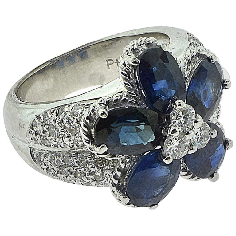 Flower Sapphire and Round Side Diamond Cluster Cocktail Ring in Platinum