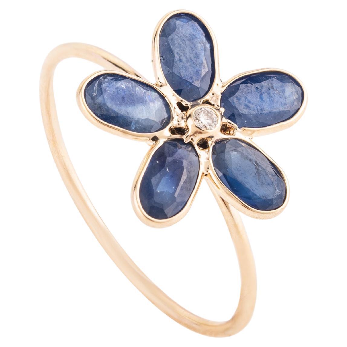 Bague pour elle en or jaune 18k avec saphir bleu et diamant en forme de fleur