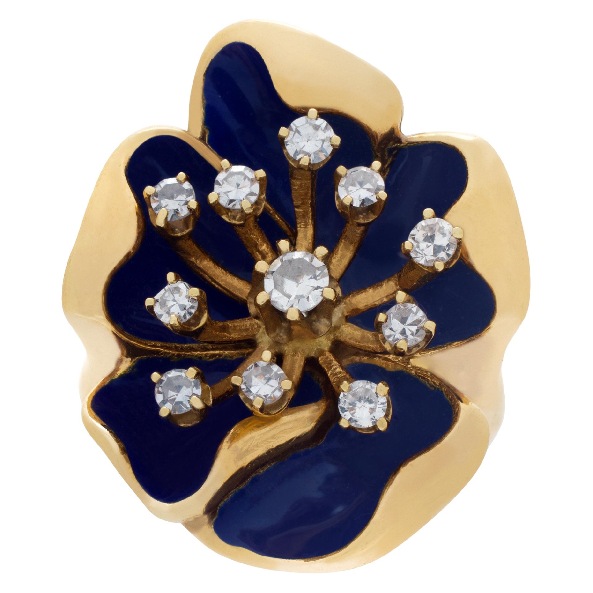 ESTIMATED RETAIL: $2,640.00   YOUR PRICE: $1,900.00
Flower shape ring with blue enamel and 0.30 carat in diamond accents in 14k. 
Ring is 0.95