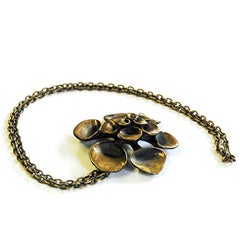 Flower shaped Bronze necklace by Hannu Ikonen, Finland 1970s