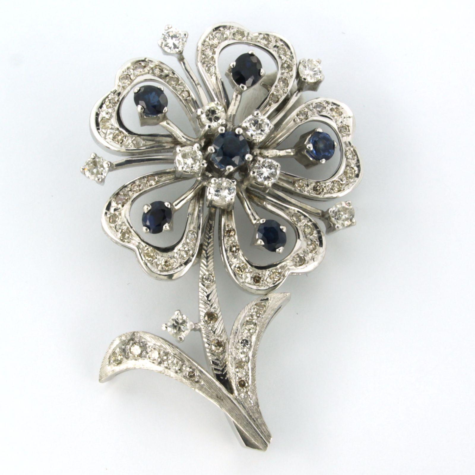 Brilliant Cut Flower shaped Brooch set with sapphire and diamonds up to 1.50ct 14k white gold For Sale