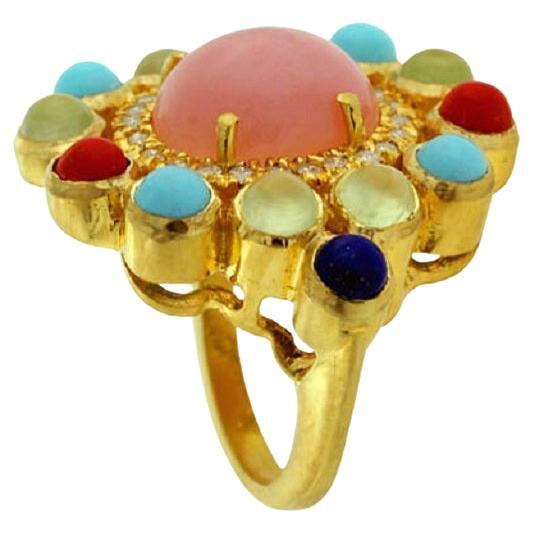 Bague multi-pierres en forme de fleur avec diamants en or 18 carats