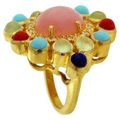 Bague multi-pierres en forme de fleur avec diamants en or 18 carats