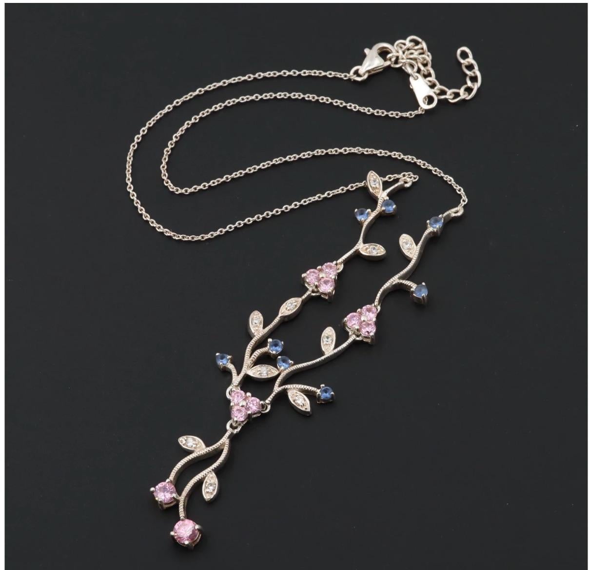 A charming Designer Flower Filled Multi-Colored Cubic Zirconia Necklace on a Sterling Silver Chain. Made in the Czech Republic so the stones are gleaming by an artisan designer.
Perfect for your Princess!

Materials:	Sterling Silver
Measures: 