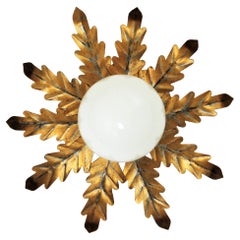 Flower Sunburst Light Fixture in Gilt Iron with Milk Glass Globe, 1960s