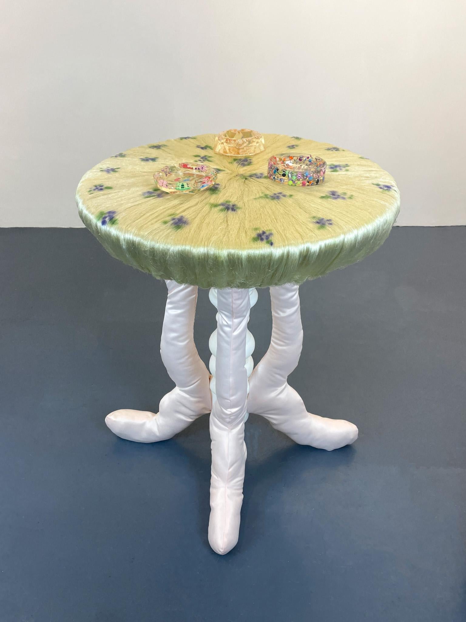 Flower Table by Maria Zakioso
Dimensions: W 55 x D 55 x H 75 cm
Materials: Wood, Silk, Artificial Hair. 

Maria Lysenko is a 28 year old contemporary artist born in Ufa, Russia. She started her art practice a few years ago, while working in fashion.