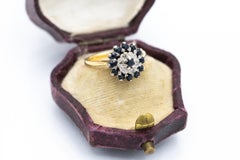 Flower vintage ring with diamonds and sapphires, UK, 1960s.