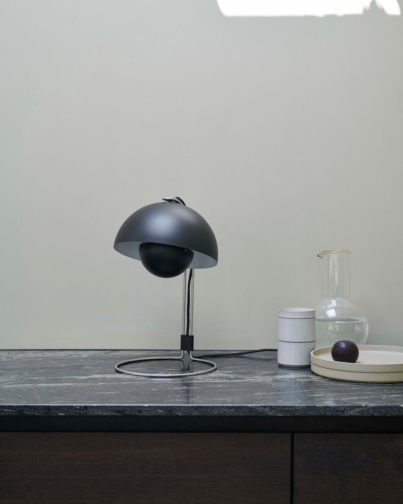 Among the most norm-breaking Danish designs of the 1960s, the iconic form of Verner Panton's Flowerpot includes the uniquely designed VP4 model, which adapts the Flowerpot into a stylish table lamp

Color : Matt Black

Environment
Indoor