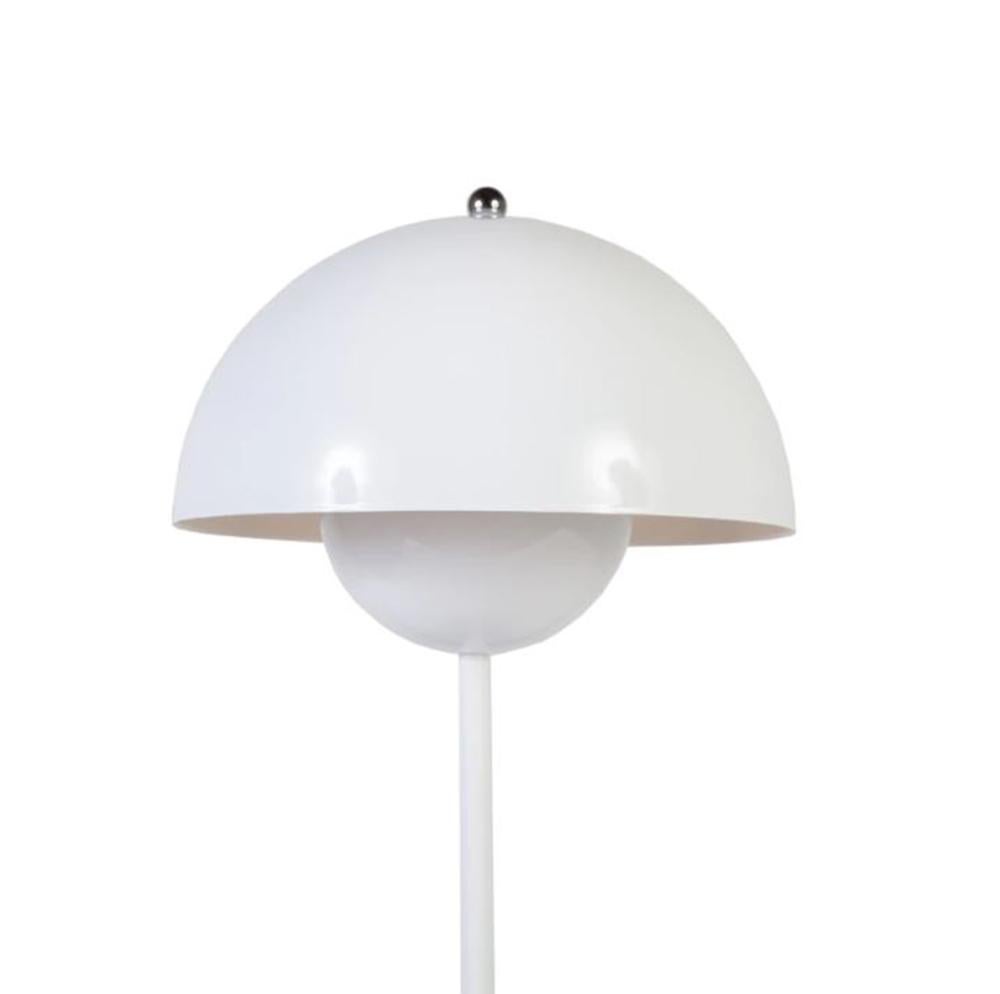 The Flowerpot table lamp with a rounded pendant that hangs from the semi-domed upper shade, design of Verner Panton 1968.
Slightly smaller in size than the table lamp version, and deliberately lightweight, the portable VP9 comes equipped with a USB