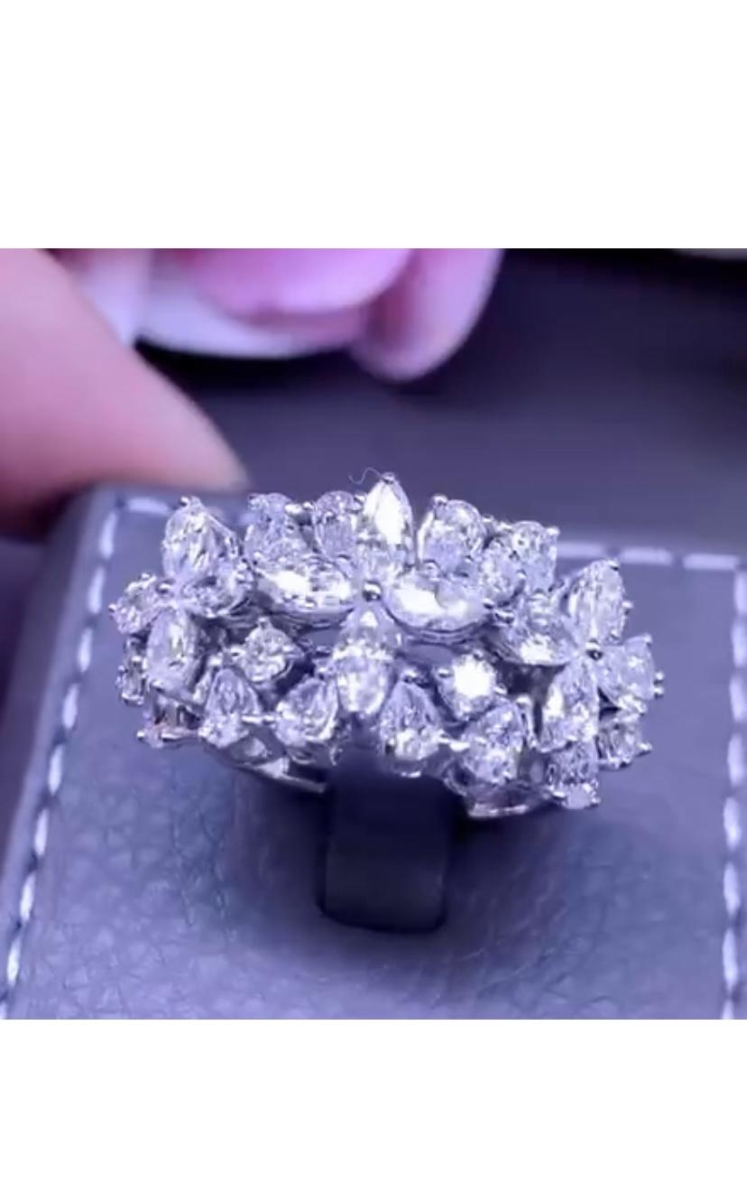 Exclusive flowers design ring , delicious and particular design, by Italian jewelry designer, very chic style.
Ring come in 18k gold with Natural Diamonds, in  perfect special cut , of 3,20 carats, F color VS clarity, so sparkly, bright.
Handcrafted