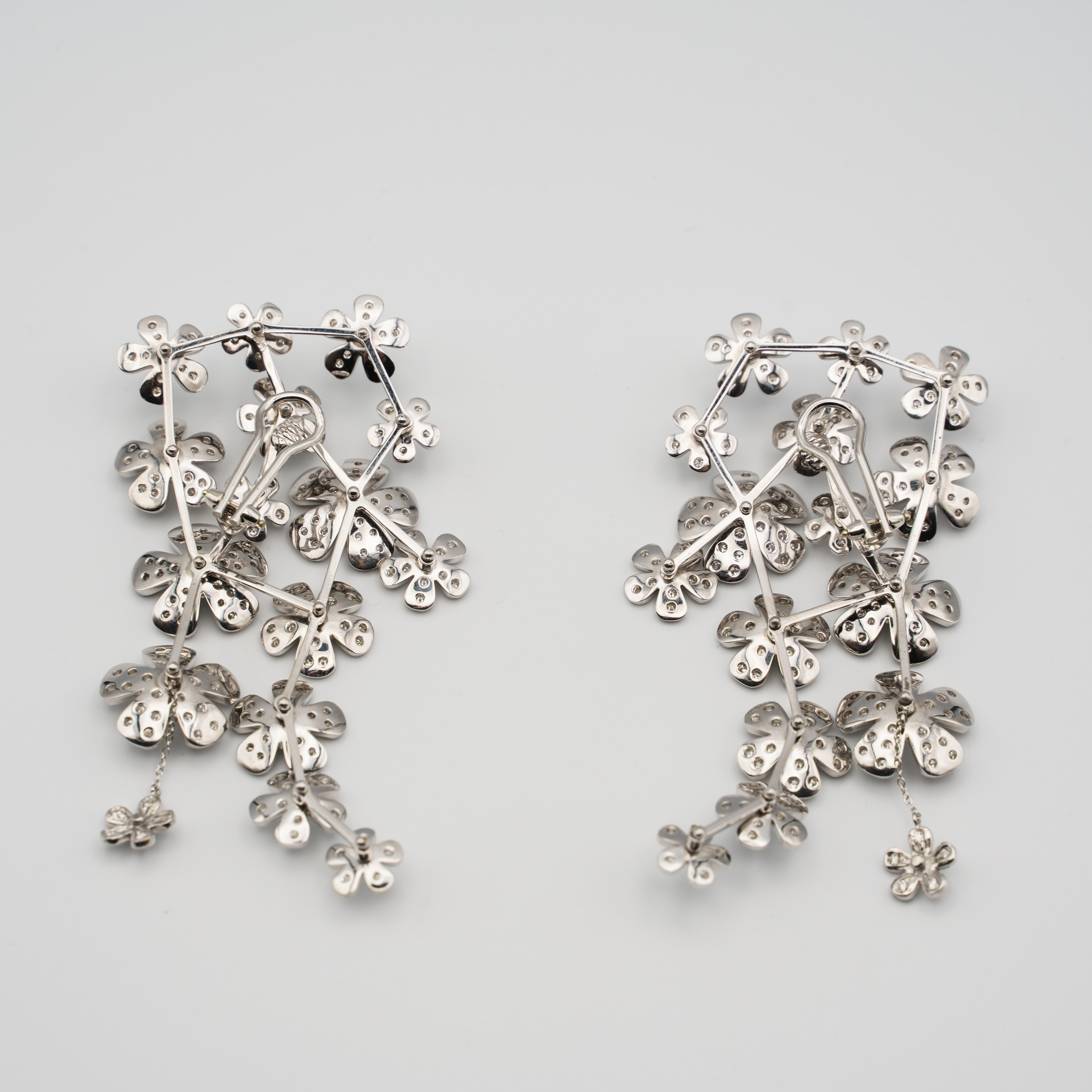 Brilliant Cut Flowers earrings in white gold and diamonds paved (approx. 10 carats).  For Sale