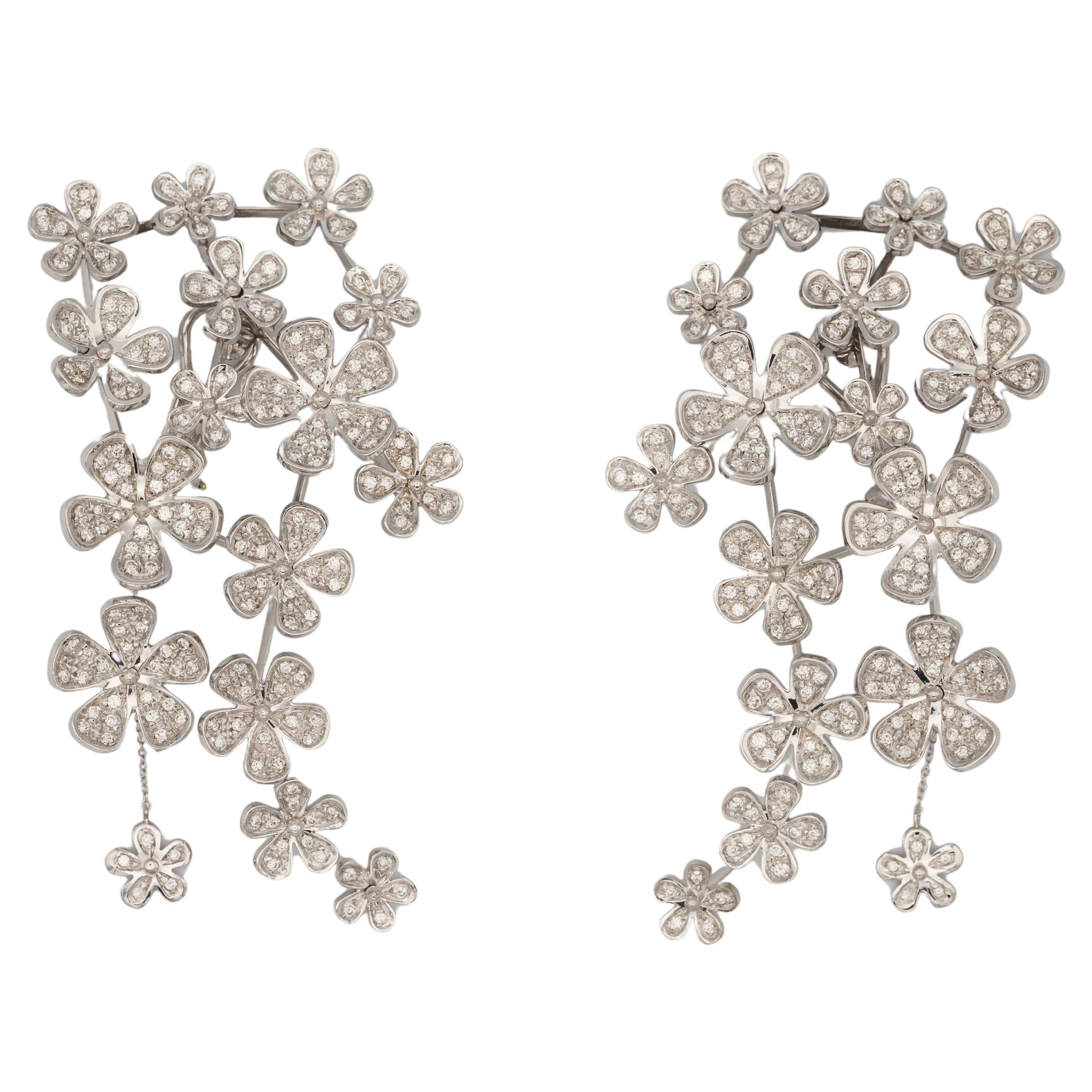 Flowers earrings in white gold and diamonds paved (approx. 10 carats).  For Sale