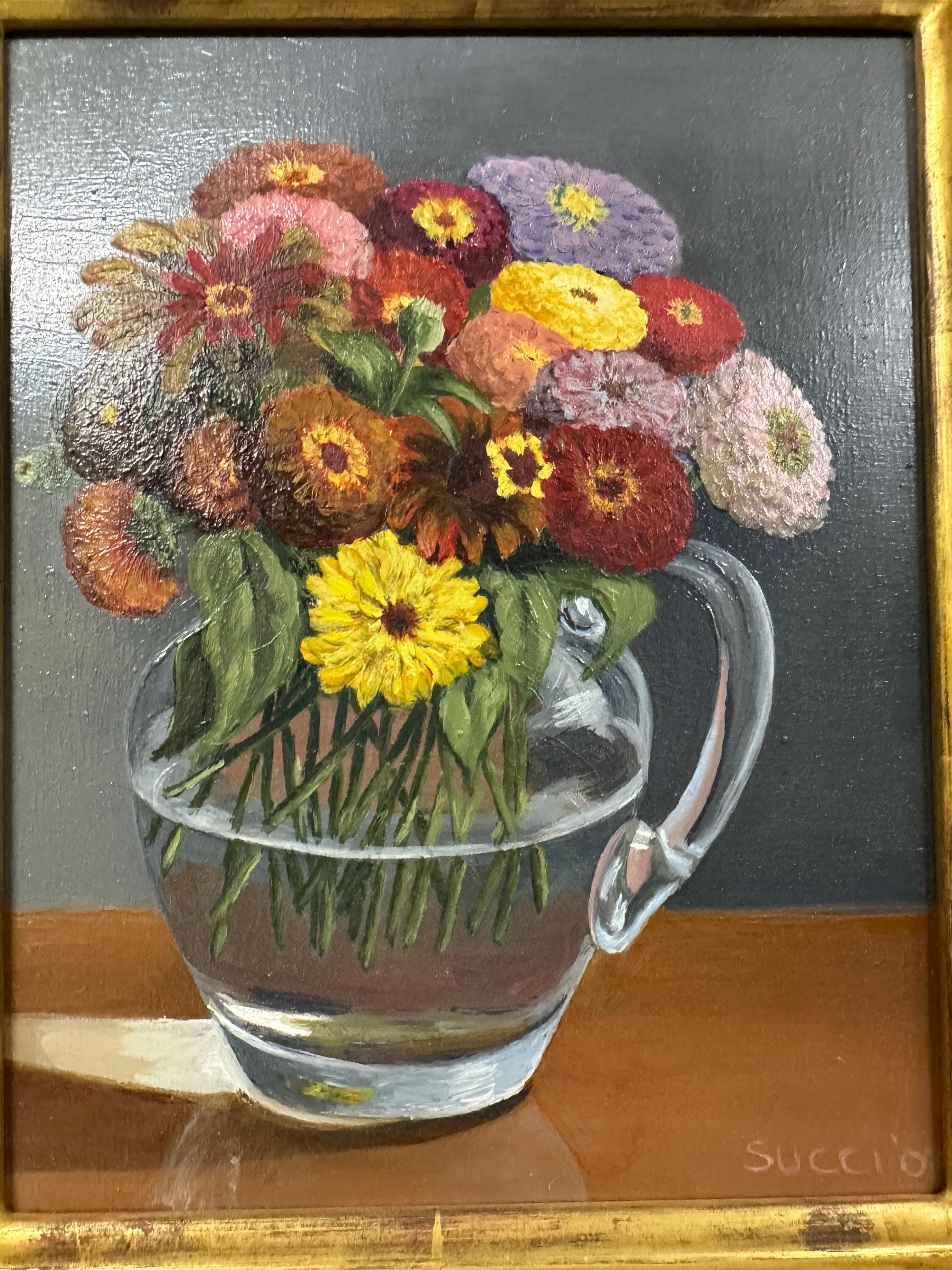 Annamaria Succi Edelstein (1935 -2024)
'Flowers in a Glass Jug'                          
Signed and dated bottom right -  Succi '08
oil on panel
Frame size 33cm x 39cm x 4 cm, no glass
