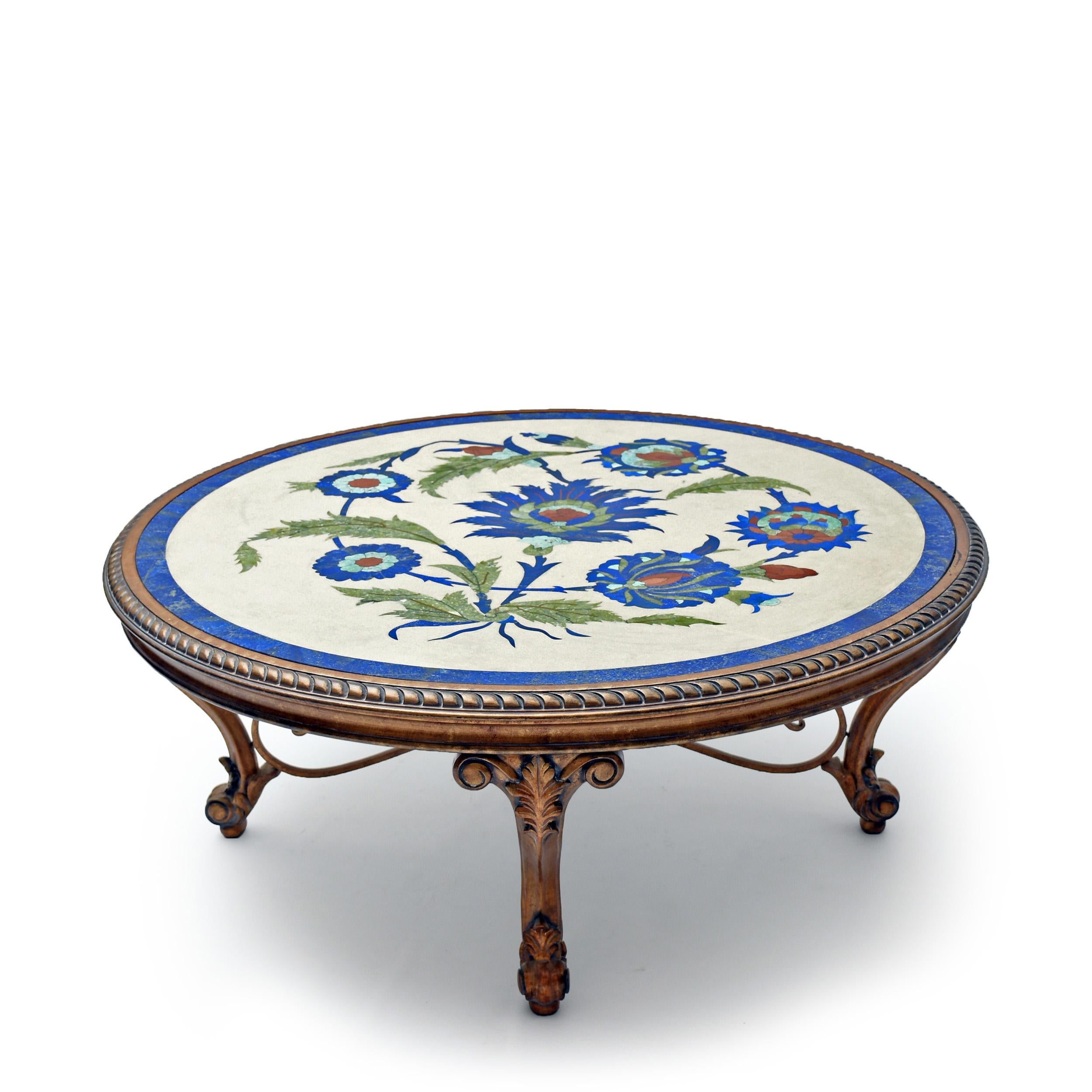 Flowers of Badakhshan centre table by Studio Lel
Dimensions: W 107 x D 107 x H 41 cm
Materials: Lapis Lazuli, Marble, Wood

These are handmade from semiprecious stone and marble in a small artisanal workshop. Please note that variations and