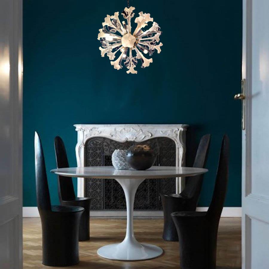 Large contemporary Sputnik chandelier composed of precious hand blown Murano flowers art glasses with clear and white color. 
 Available also a pair.
Chromed steel spherical frame, with 10 E 14 \ 4 W light bulbs.
Measures: Diameter cm 70, height