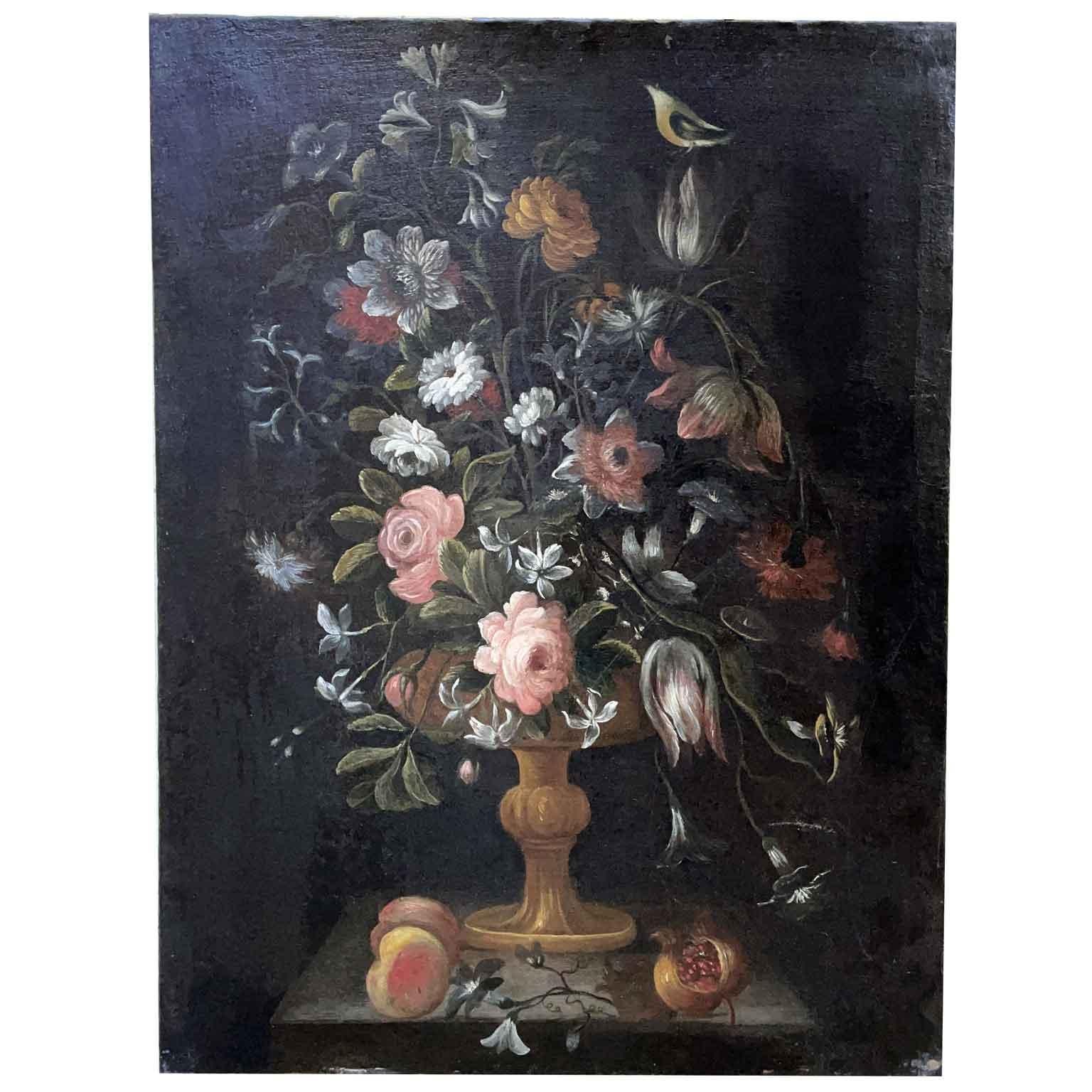 17th century Italian School still life of flowers in a vase, set of two unframed  paintings.  Oil on canvas with dark background and finely defined flowers.

These Italian Old Master Baroque Flowers Still-life paintings features a well balanced