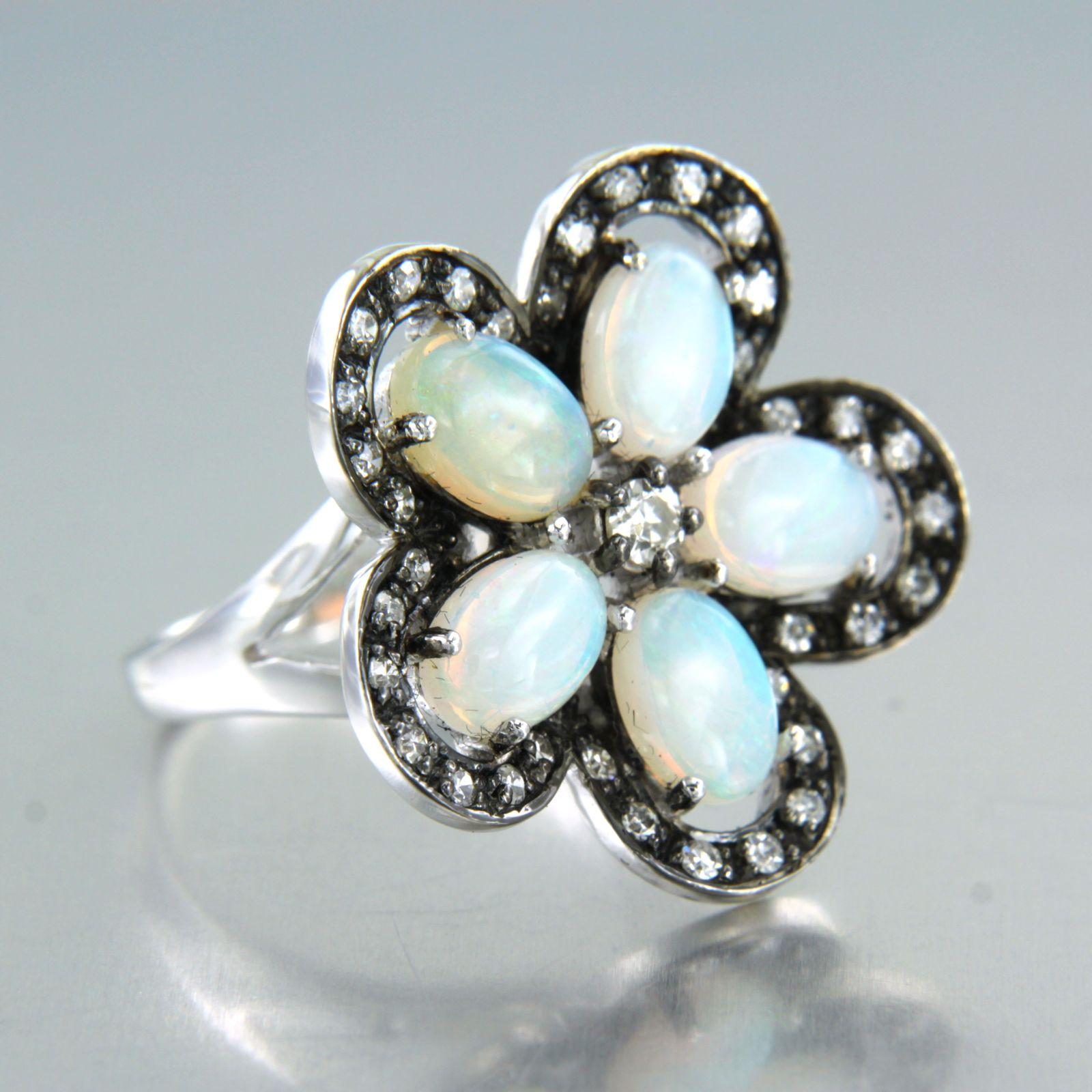 Modern Flowershaped Ring with opal and diamonds 14k white gold For Sale