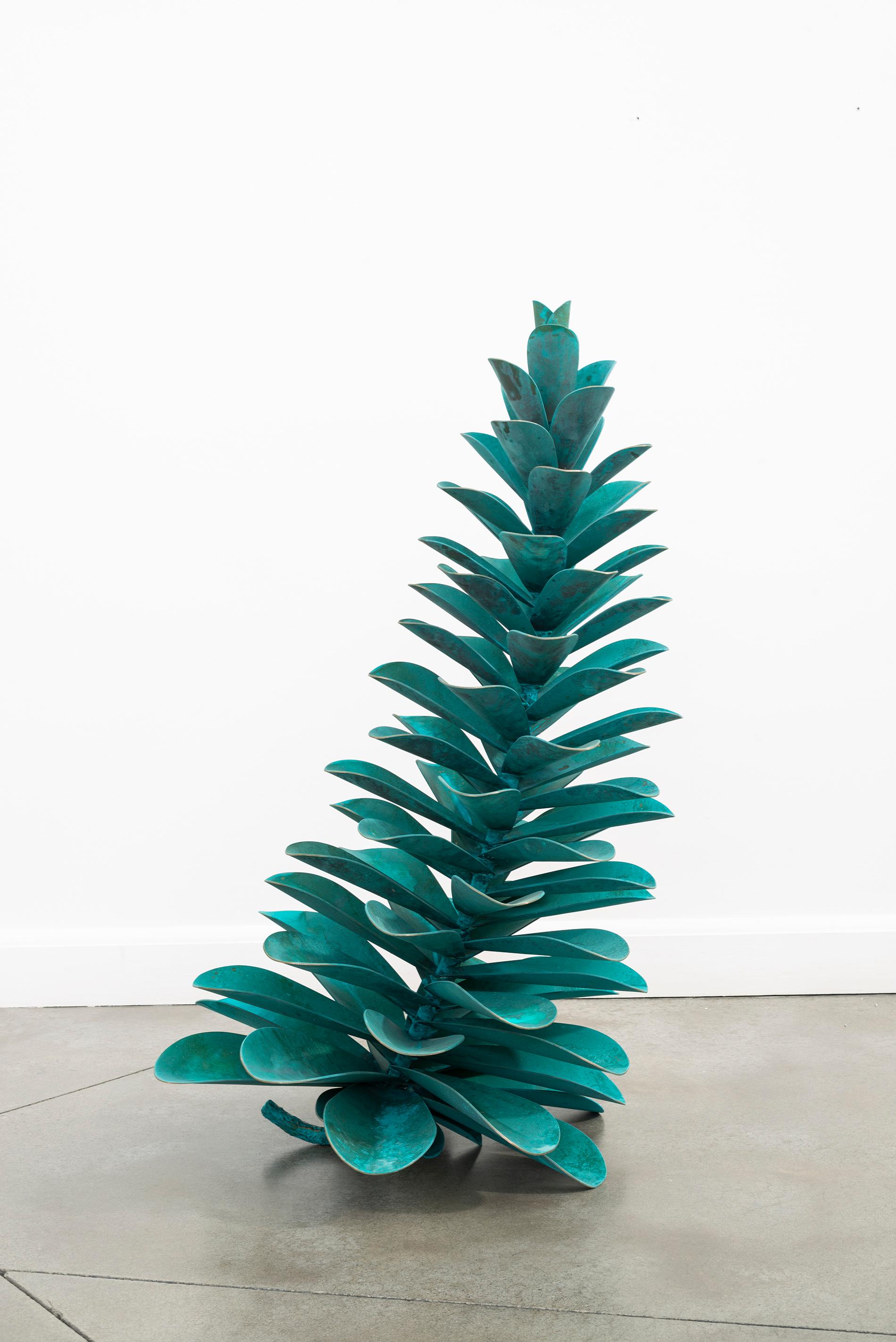 Wow! This large bronze sculpture by Floyd Elzinga is simply a ‘knock-out’ with its bright turquoise patina. The Canadian sculptor is known for using iconic imagery in his pop artwork. The series of pine cones he’s created emulates the details of the
