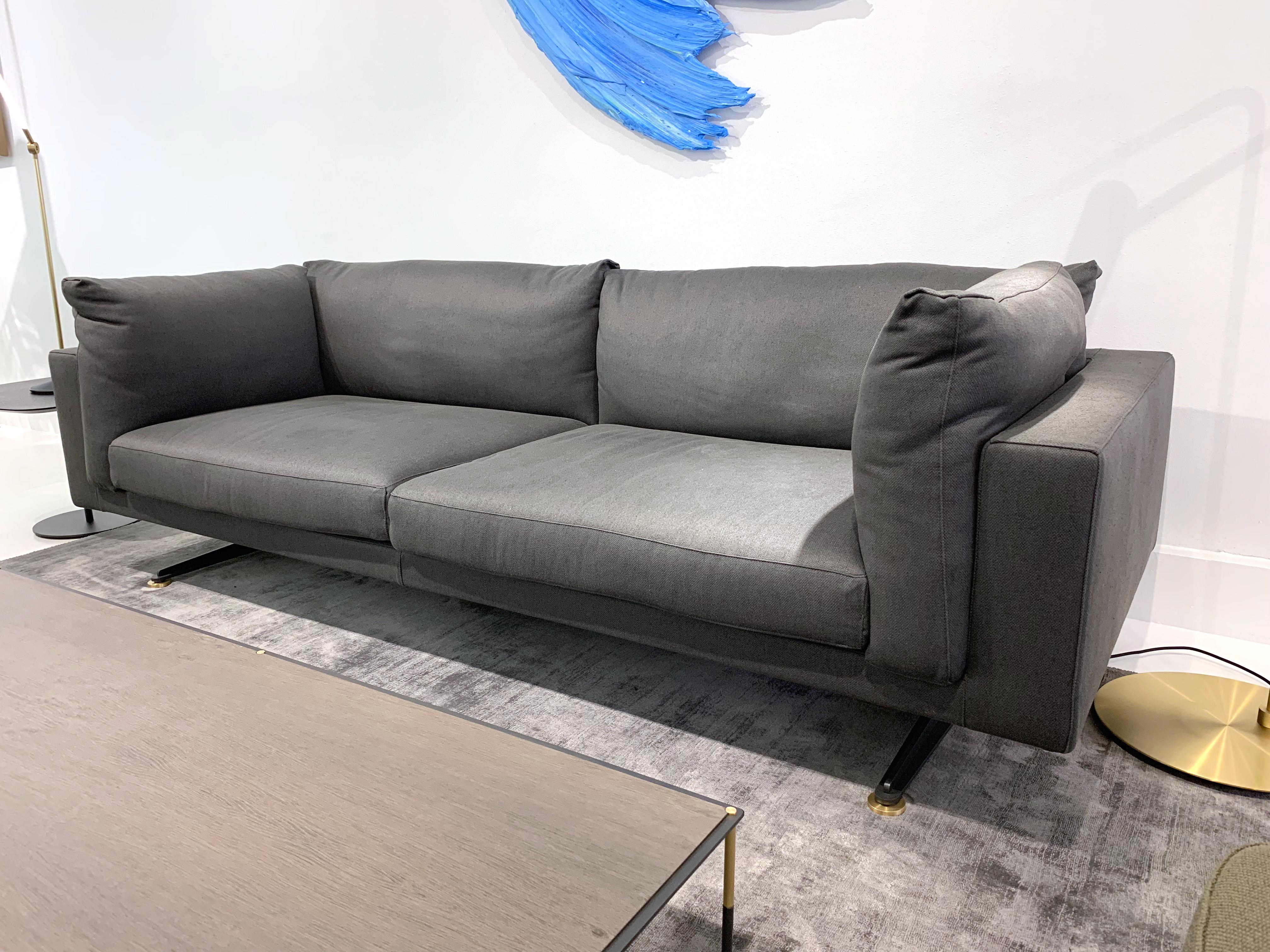 Floyd-Hi sofa shown in gray fabric upholstery. Sleek and chic and an excellent seating addition that complements any modern style. Designed by Piero Lissoni.

Dimensions: 92.9