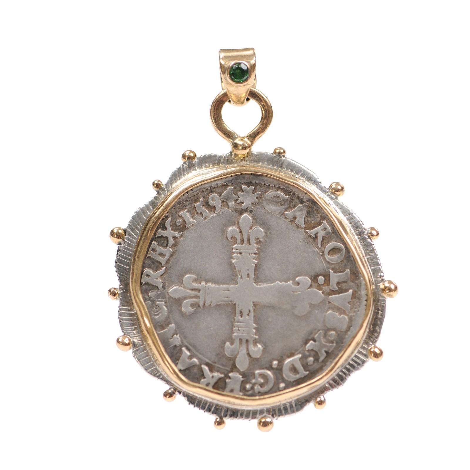 Una [moneda] de 1/4 de ecu verdaderamente especial, acuñada en 1594 en Nantes, Francia. Esta moneda de plata 