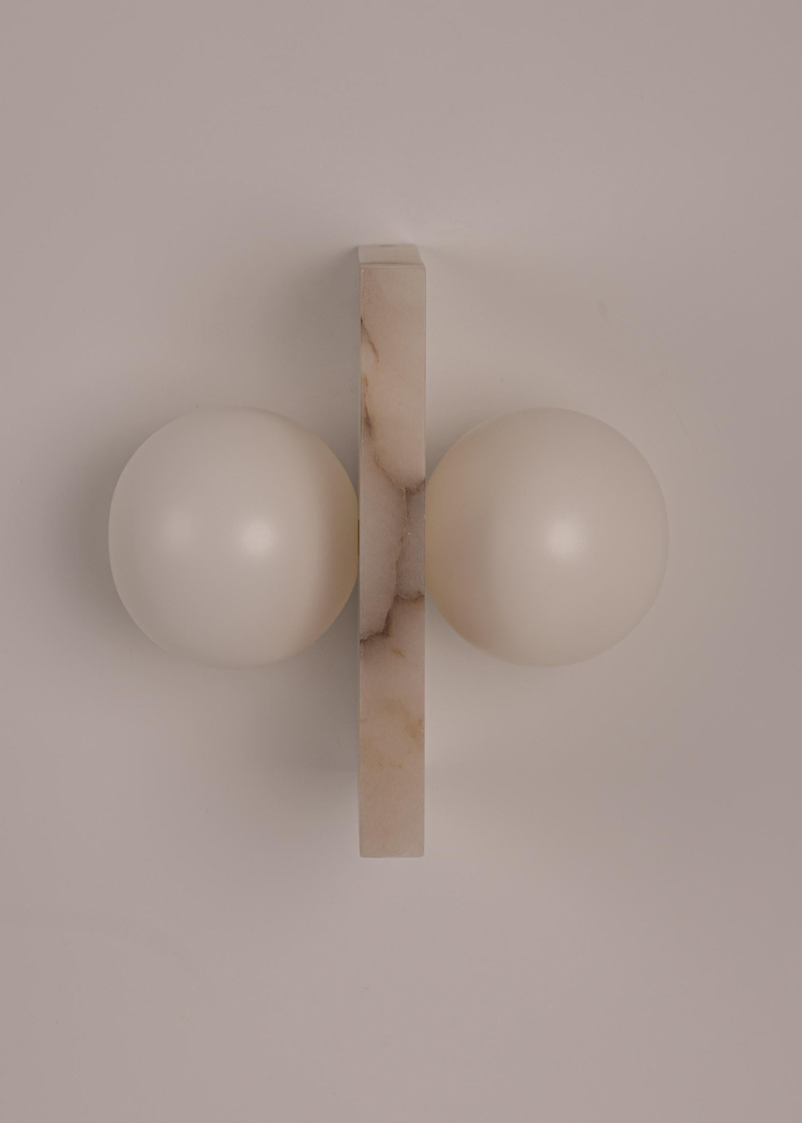 Fluji White Alabaster Wall Sconce by Simone & Marcel
Dimensions: D 20 x W 32 x H 30 cm.
Materials: White alabaster.

Available in different brass and alabaster options and finishes. Custom options available on request. Please contact us. 

All our