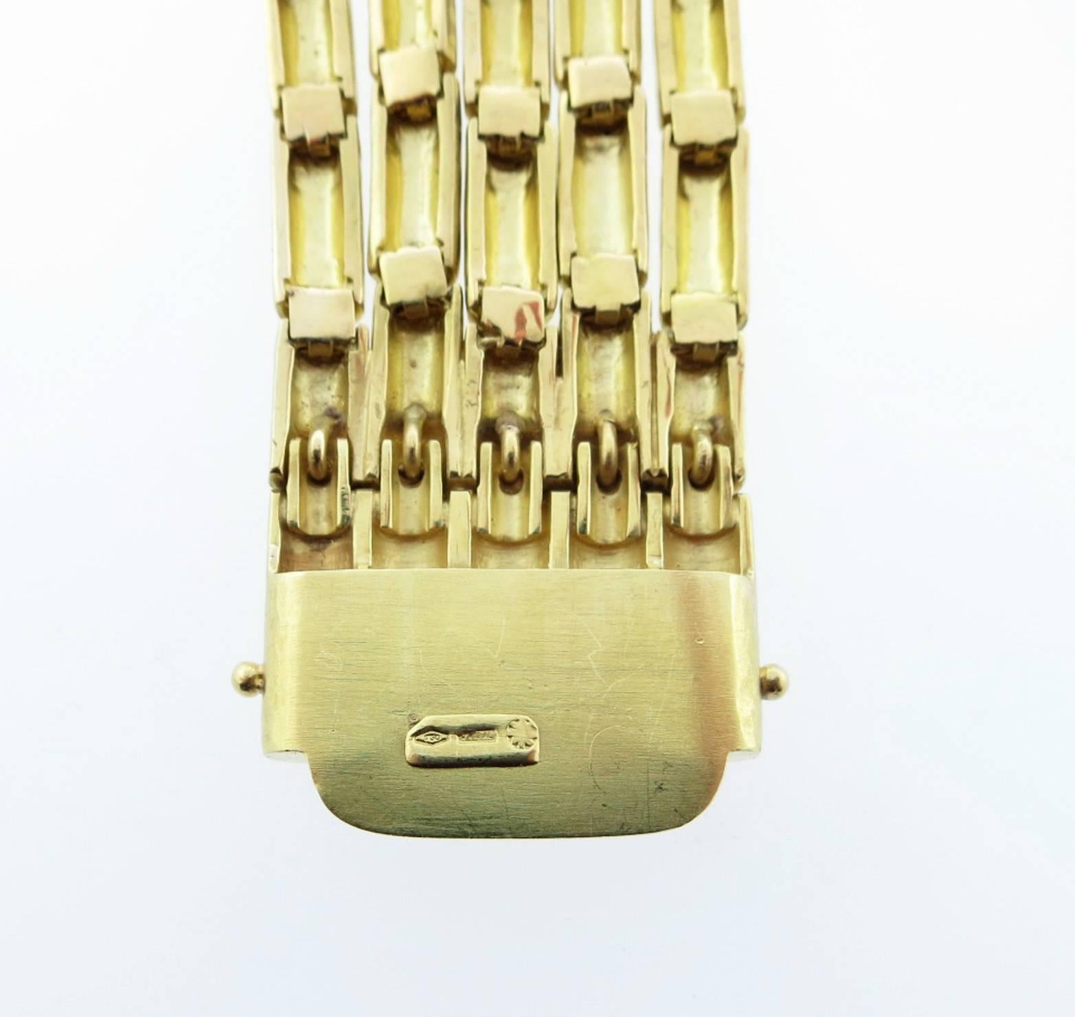 Contemporary Fluid 18 Karat Yellow Gold Ruby and Diamond Bracelet