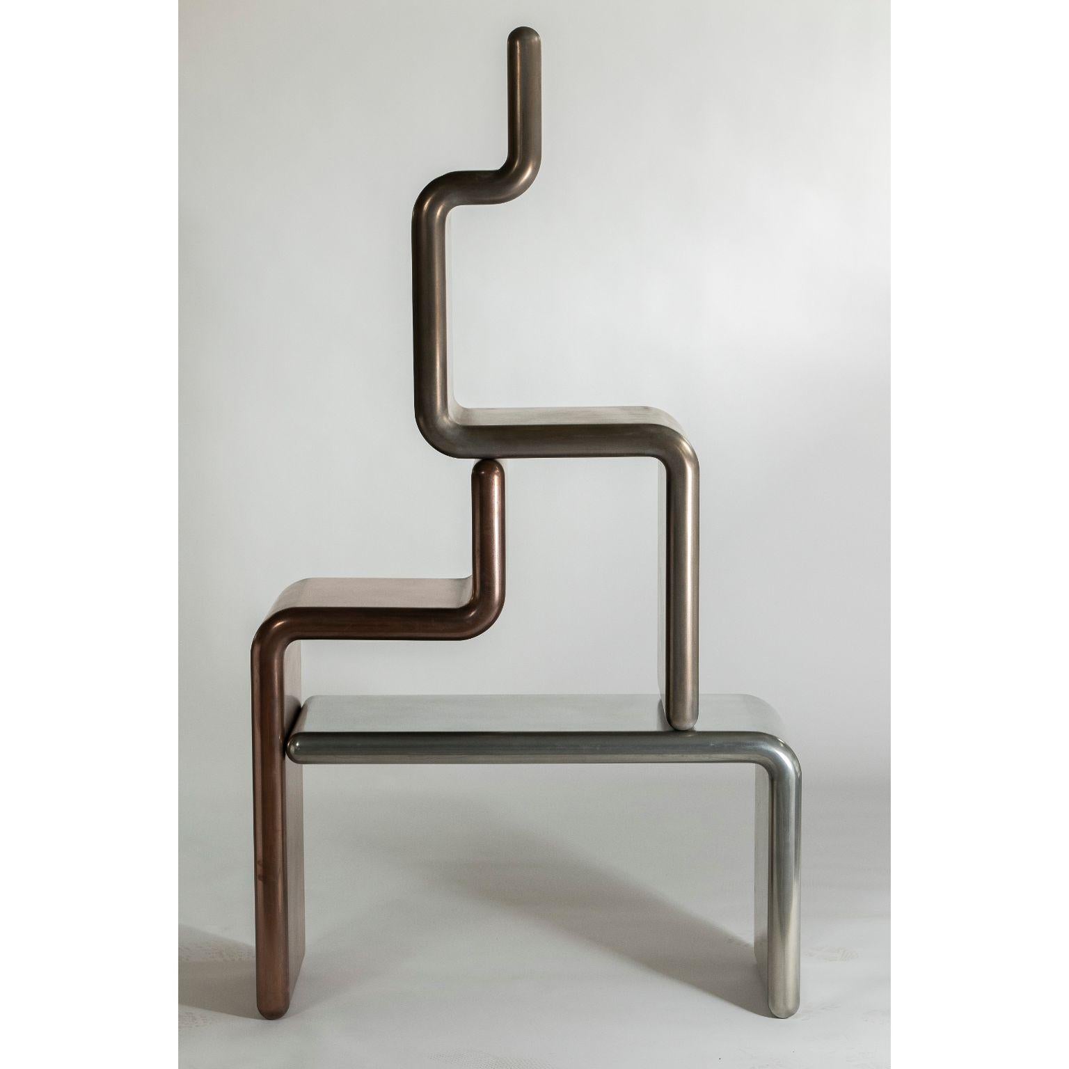 Fluid shelf by Roberto Giacomucci
Materials: Wood, liquid metal
Dimensions: L 100 x P 40 x H 180 cm

The freak collection is made of wood coated with liquid metal, a 95% real metal paint and like the metal oxidizes over time.

Roberto