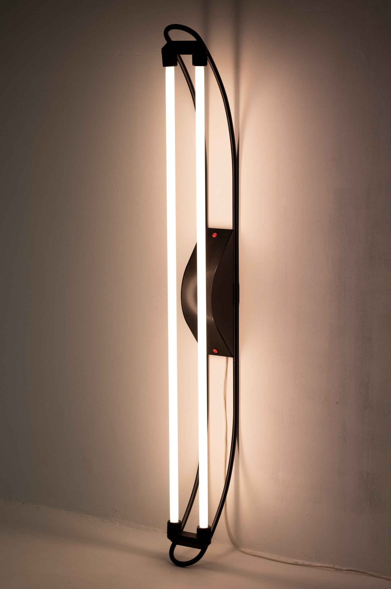 Floor lamp designed by Gian Nicola Gigante for Zerbetto, Italy, 1980s. 
This Italian designer is known for his ingenious fluorescent lamps. 
This rare piece is very versatile as shown in the photos and is indebted to the art of Dan Flavin.
Dan