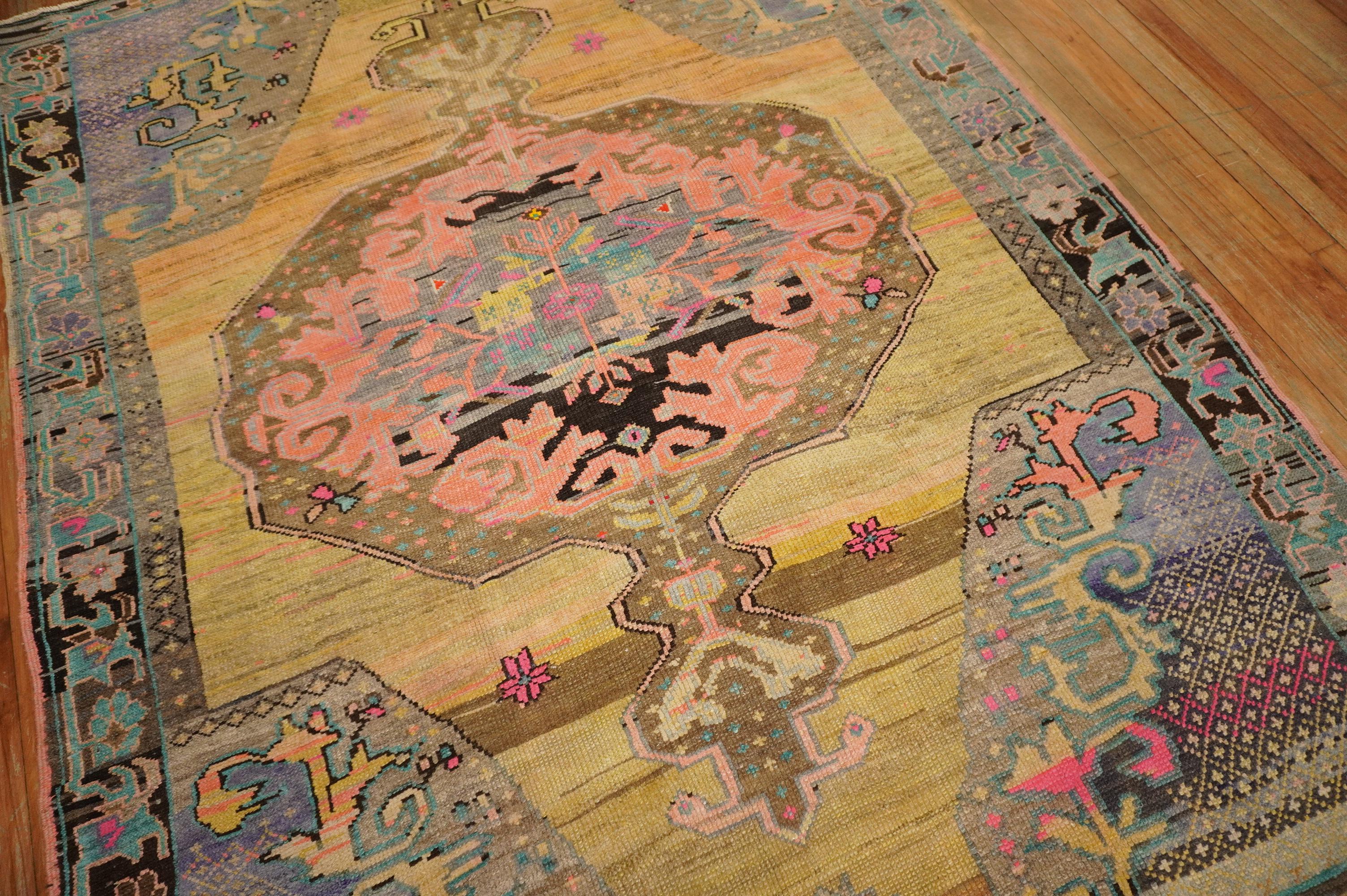 Fun and fluorescent color mid-20th century floral Turkish Anatolian rug.

Measures: 6'1” x 8'3”.

   