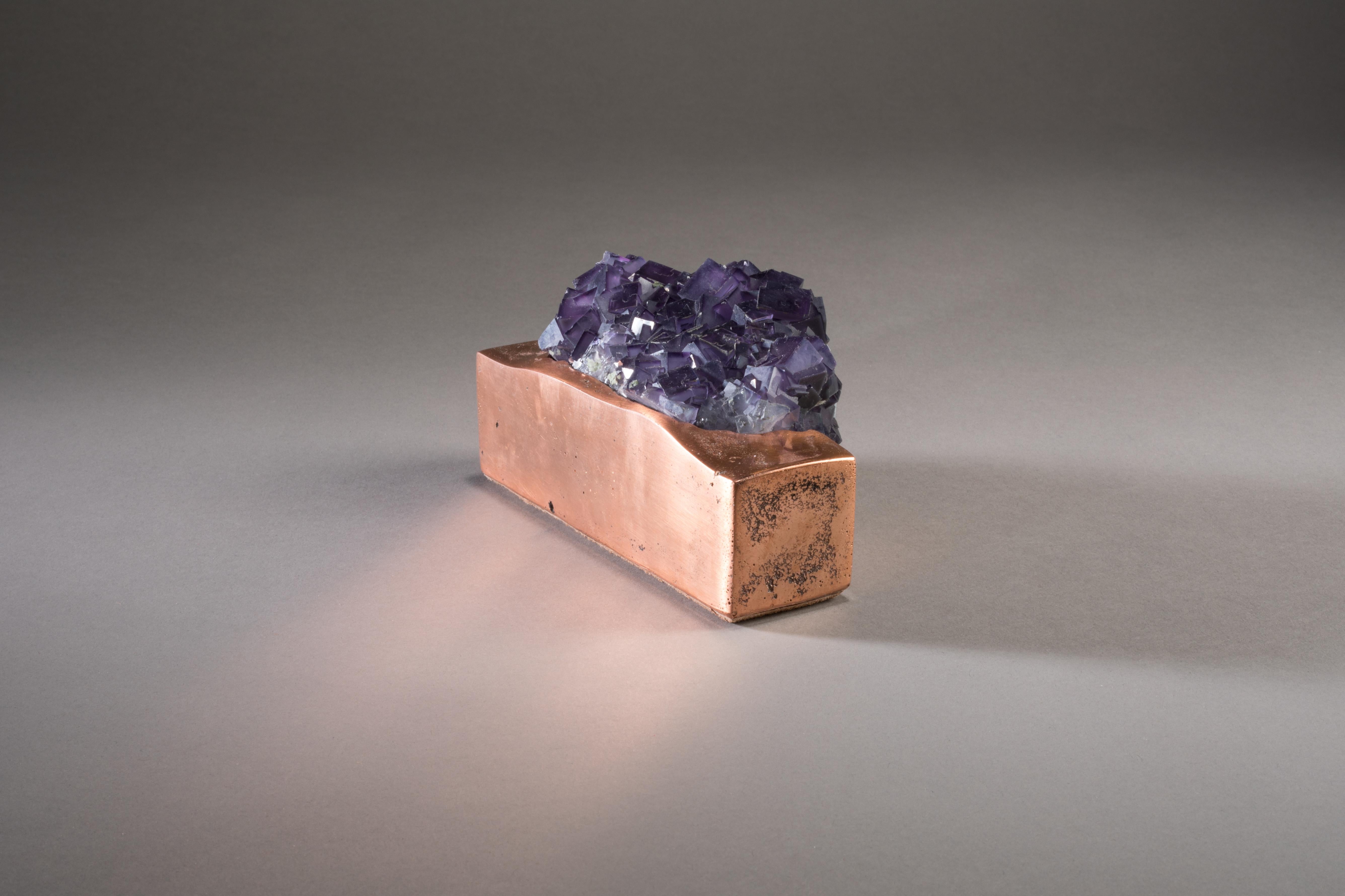 Fluorite on mirror polish copper base.