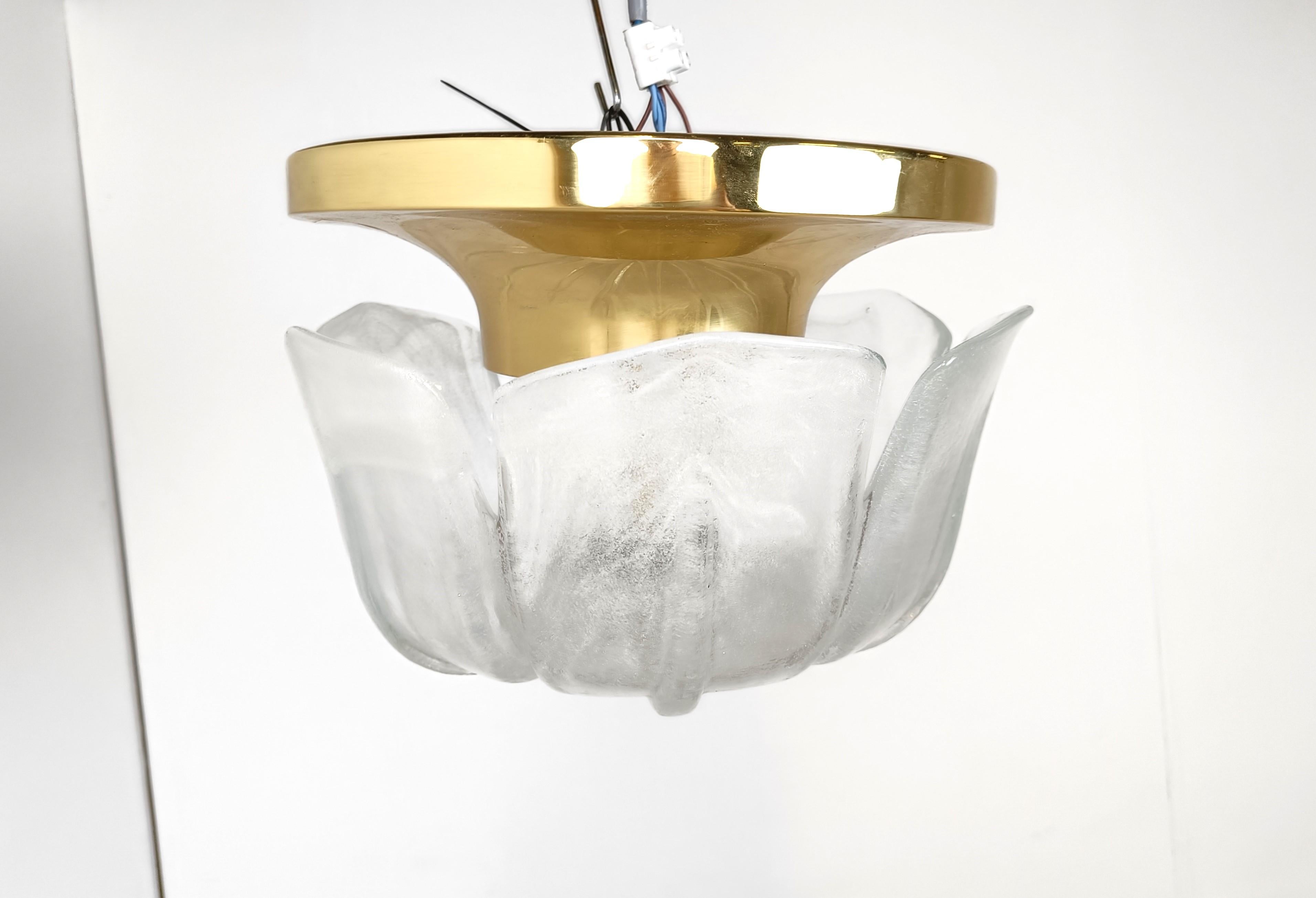 Mid century glass flower shaped ceiling light by Glashutte Limburg. 

Beautifully shaped glass leaves and a brass mounting plate and finial.

1960s - Germany

Dimensions:
Height: 25cm/9.84