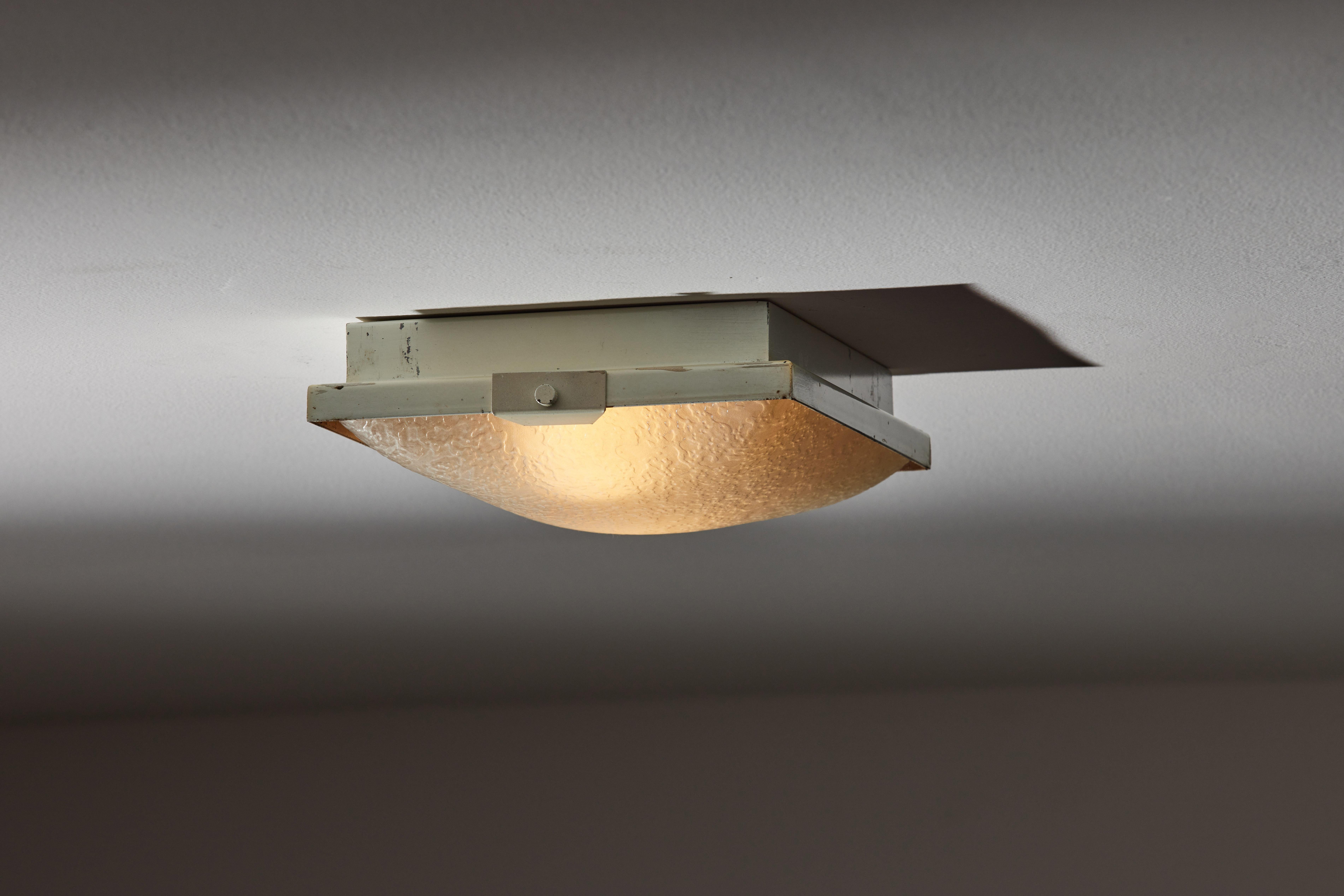Flush mount ceiling by Stilnovo, circa 1960's. Glass, painted metal. Wired for U.S. standards. We recommend two E14 4ow maximum bulbs. Bulbs provided as a one time courtesy. Depth indicated is length. Retains original manufacturers stamp.