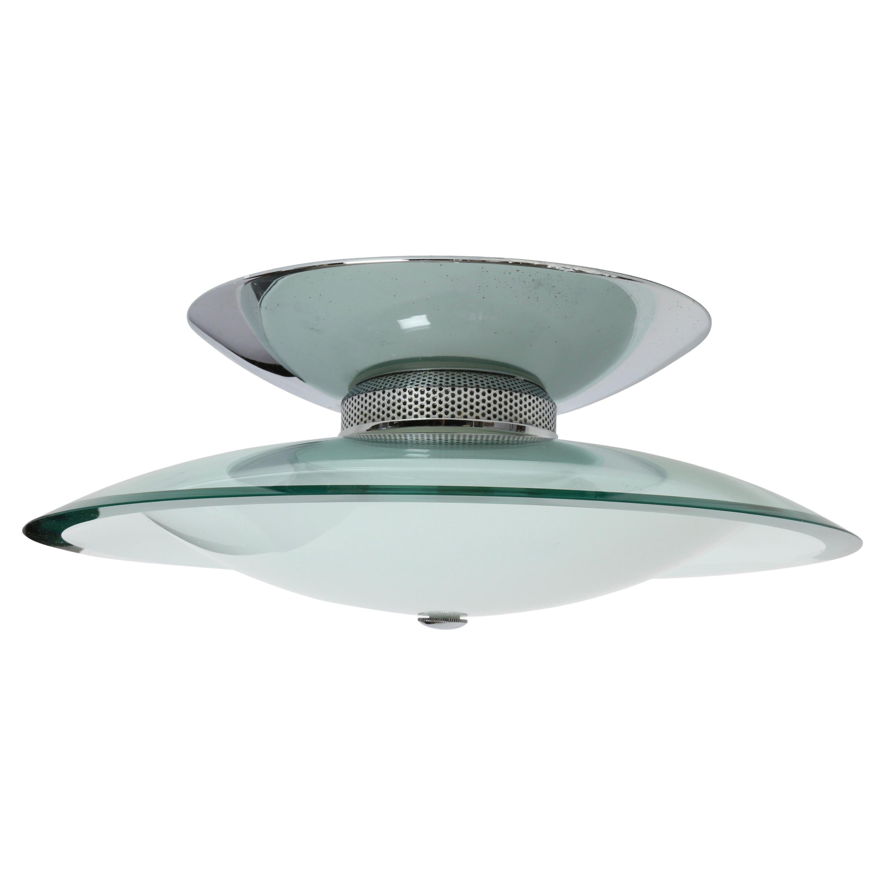 Flush mount ceiling light in the style of Fontana Arte.
Made in Italy in 1960s.
Two kinds of glass.
Takes 4 candelabra bulbs.
Complimentary US rewiring upon request.

We take pride in bringing vintage fixtures to their full glory again.
At Illustris