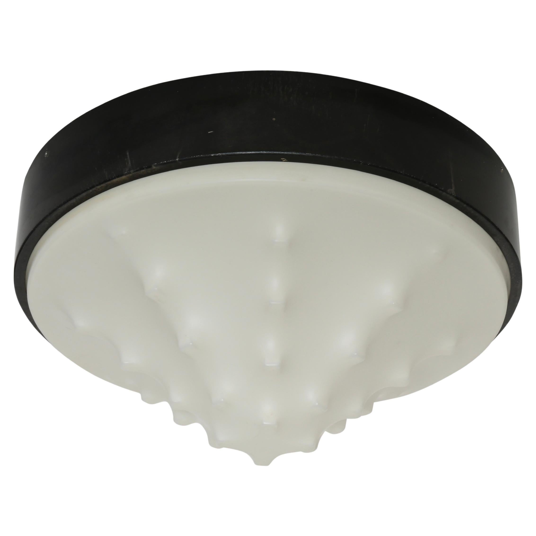 Flush mount ceiling lights, a pair
Made in Spain, 1970s
Plastic shades, enameled metal
Take 3 Edison bulbs each
Complimentary US rewiring upon request
Priced and sold as a pair.