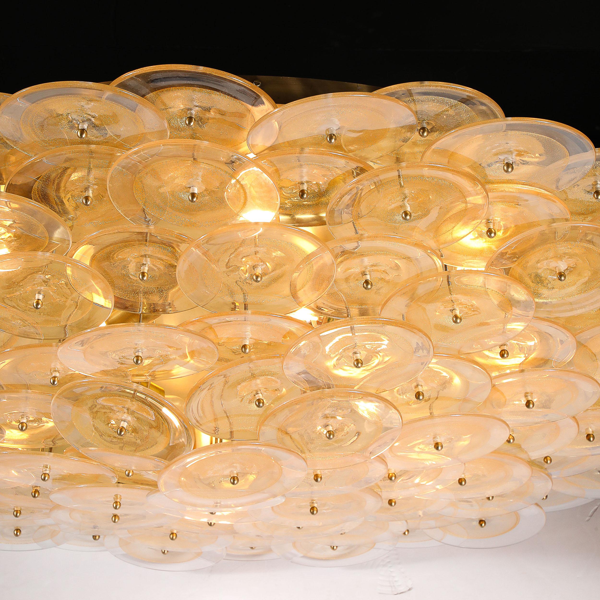 italien Lustre à disques de Murano en verre doré et transparent et laiton brossé en vente