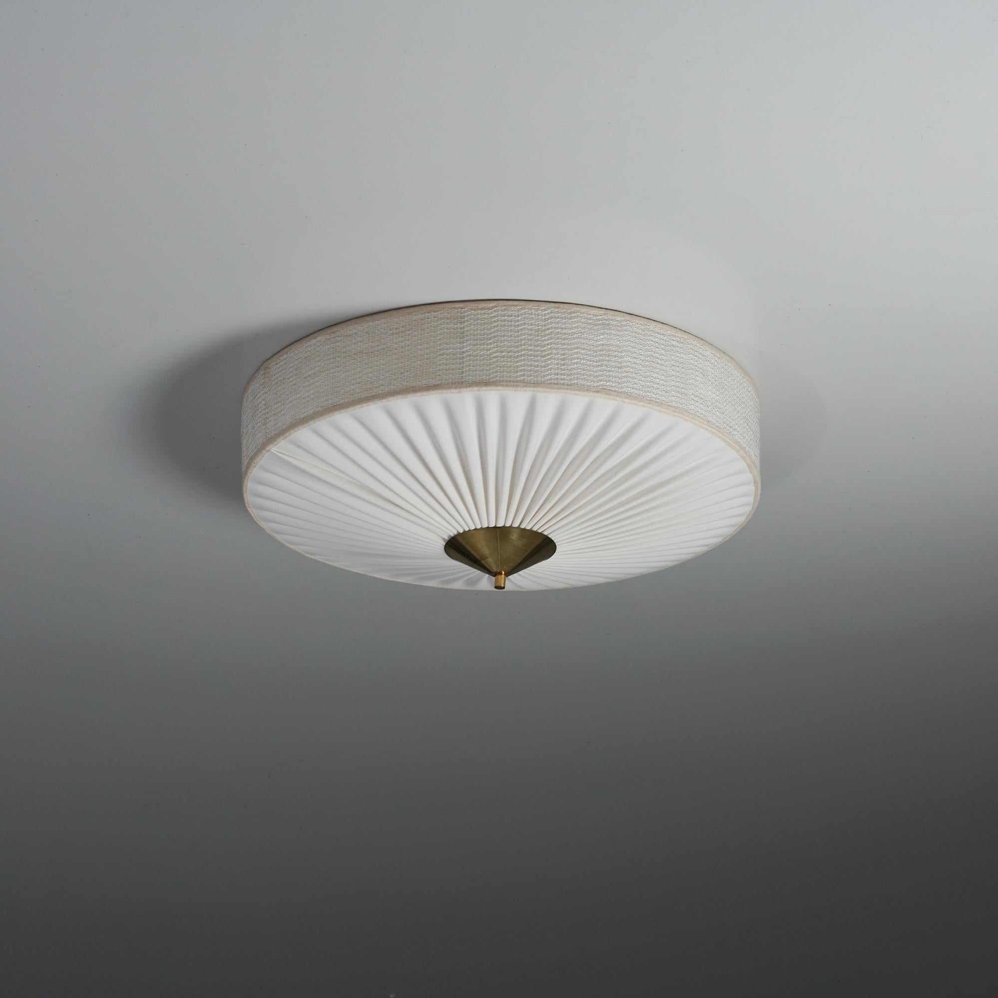 Flush mount, manufactured by Valinte Oy, 1960s. Renewed fabric shade. Brass details. Good vintage condition, minor patina consistent with age and use.