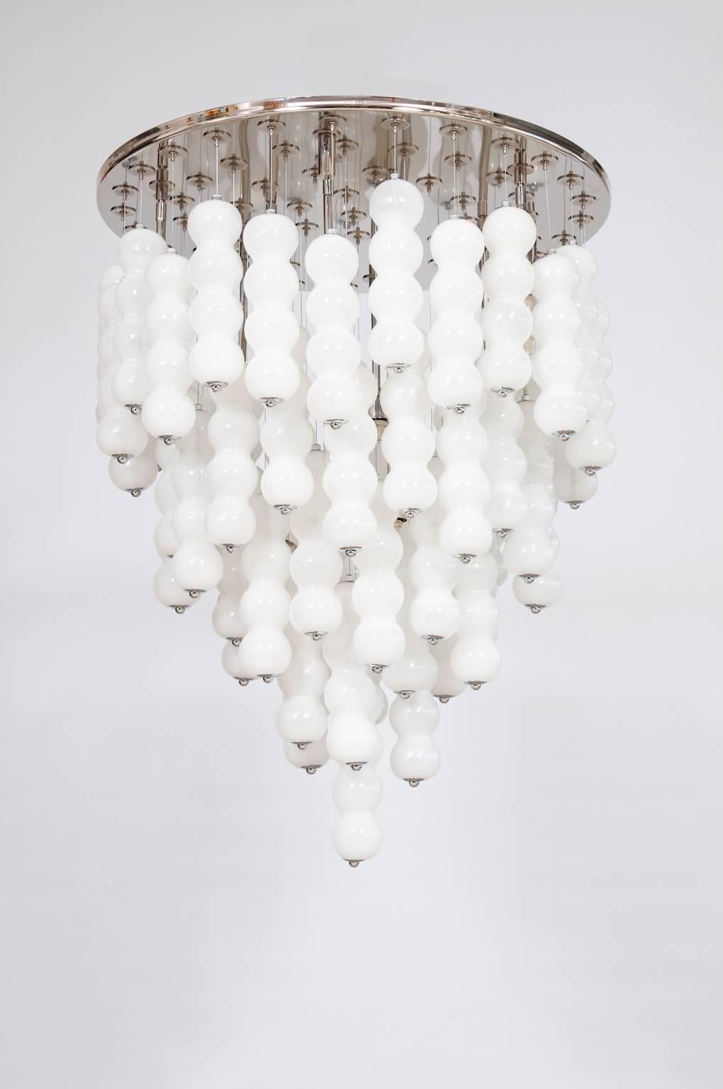 Suspension Flushmount White Spheres in Blown Murano Glass Mazzega 1990 Italy
Elegant and massive Italian Venetian flushmount in Murano glass with white spheres composed by elegant long white glass elements suspended with a thread of steel, all is