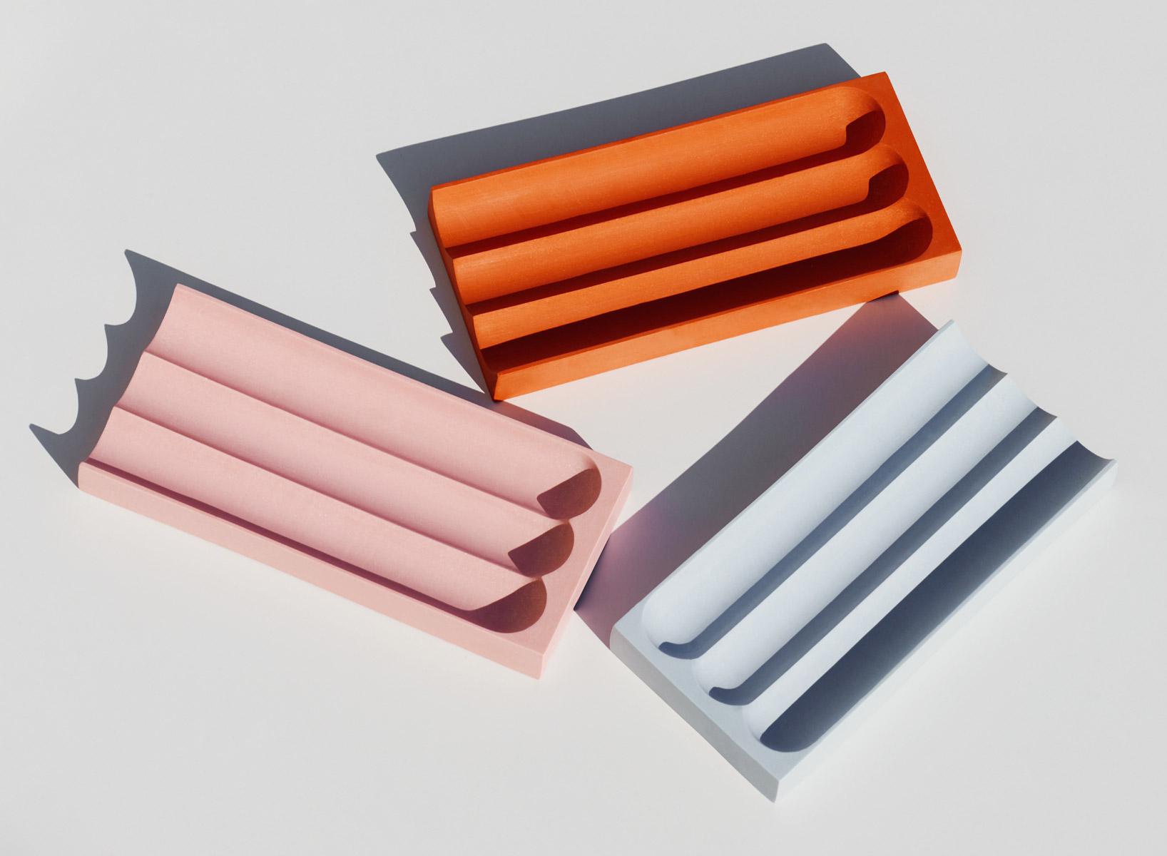 The Flute Pencil Tray is made from cast pigmented and sanded Jesmonite and evolves from Tino Seubert's tubular motif developed in his Monolithic Font for Wallpaper* Handmade 2017. The happy colour trays brighten and organise any desk space.