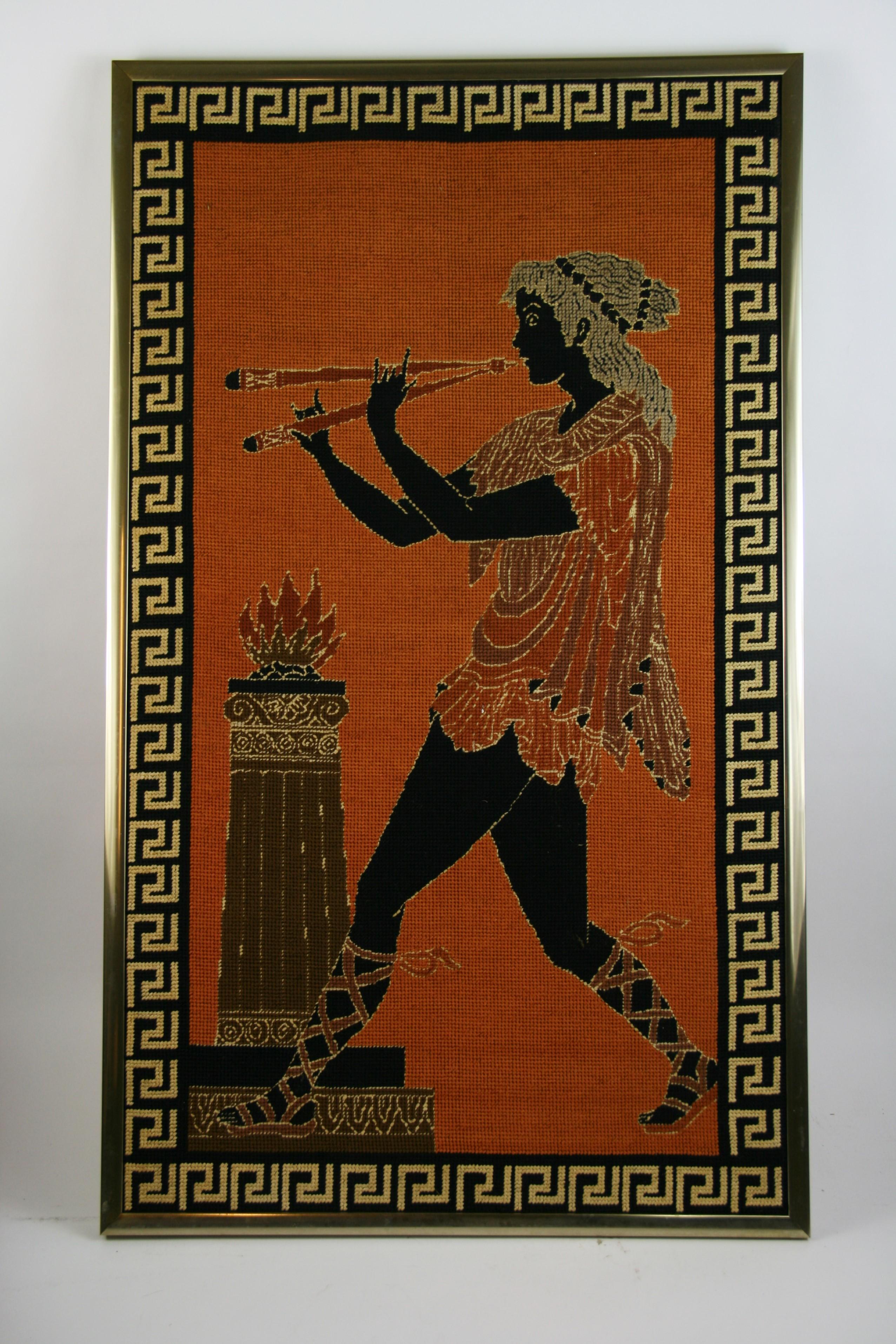 3783 hand woven tapestry of a mythical flute player set in a gilt metal frame.