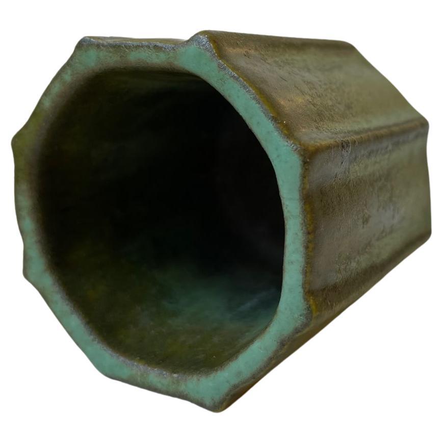 Small octagonal pottery vase verdigris green glazes. Unknown Scandinavian ceramist circa 1930 in the style of Arne Bang. It has no signature or markings. Measurements: H: 6.5 cm, D: 6.5 cm