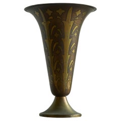 Vaso scanalato Art Deco in metallo patinato e ottone 1930