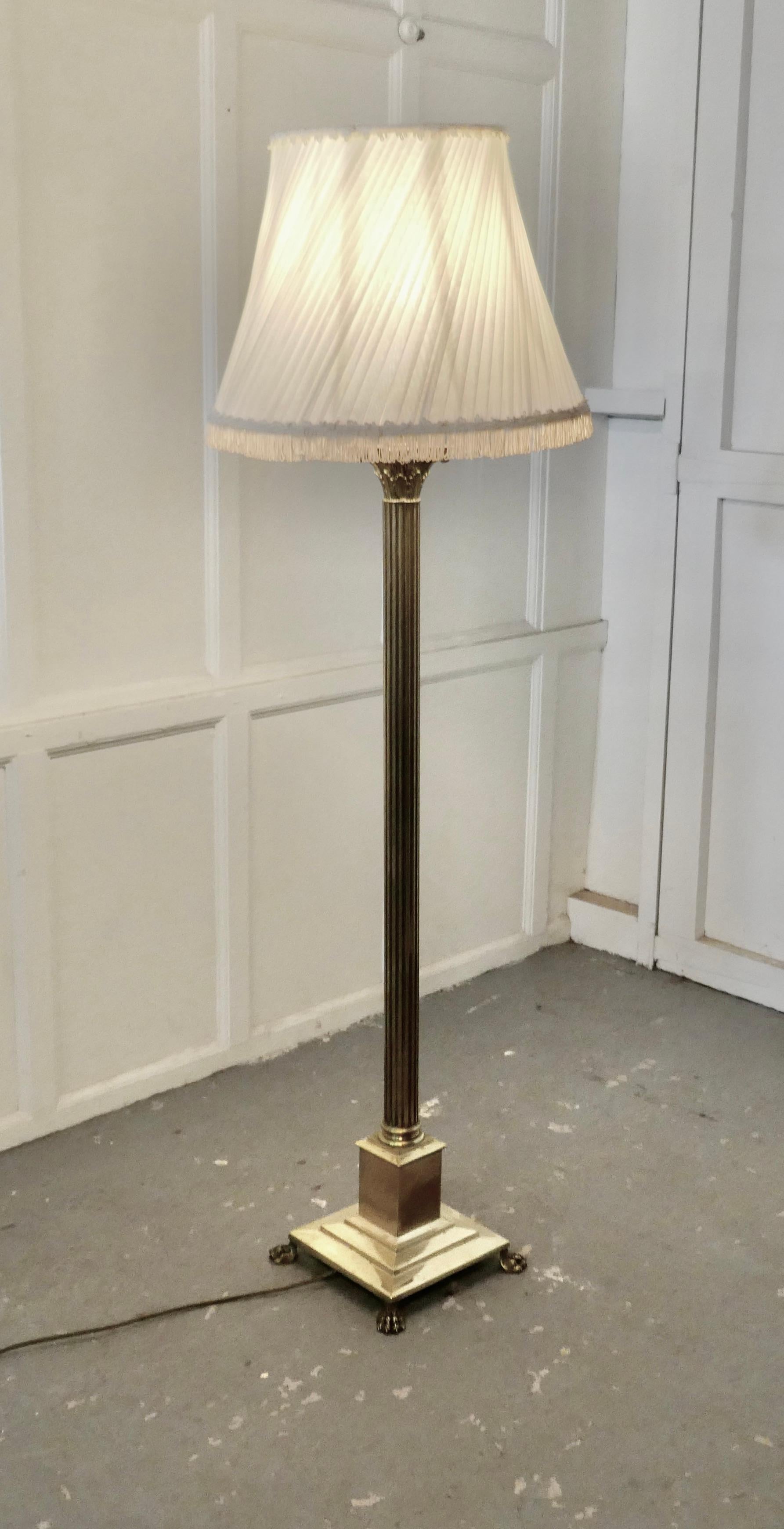 Fluted brass column floor lamp, brass standard lamp 


This is a very attractive piece, the lamp has a chunky centre column and a square base set on paw feet
 The lamp is all working, the wiring appears to be new, the lamp is in excellent