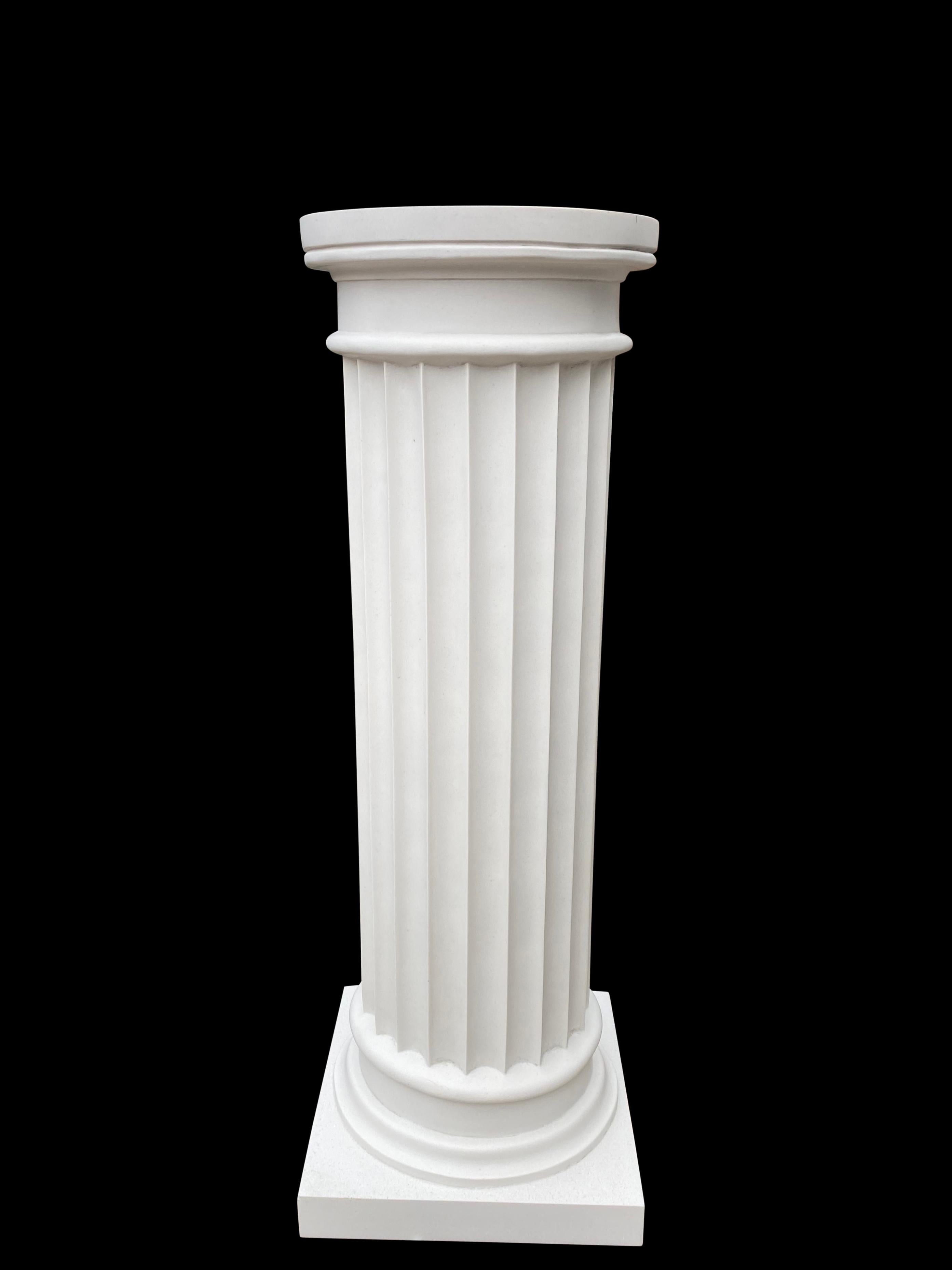 This 20th-century fluted column is a distinguished architectural element that exemplifies classic design. The column features gracefully detailed fluting that adds texture and visual interest, making it a versatile piece for both traditional and