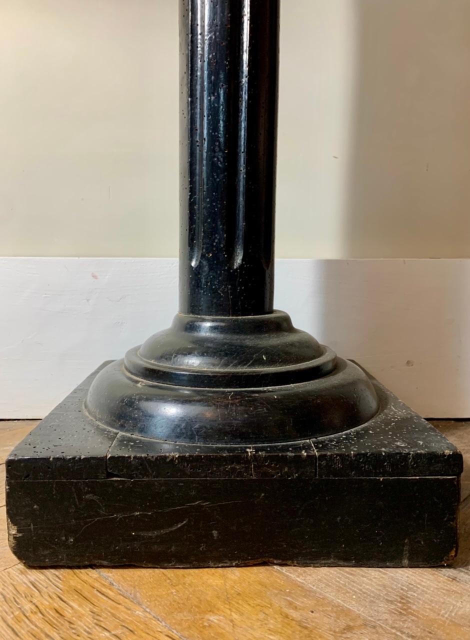 Magnificent column forming a saddle in blackened wood with a corinthian-shaped fluted shaft in the Louis XVI style.
This fantastic straight shaped pedestal is carved from solid beech wood with a beautiful polished and black lacquered surface.