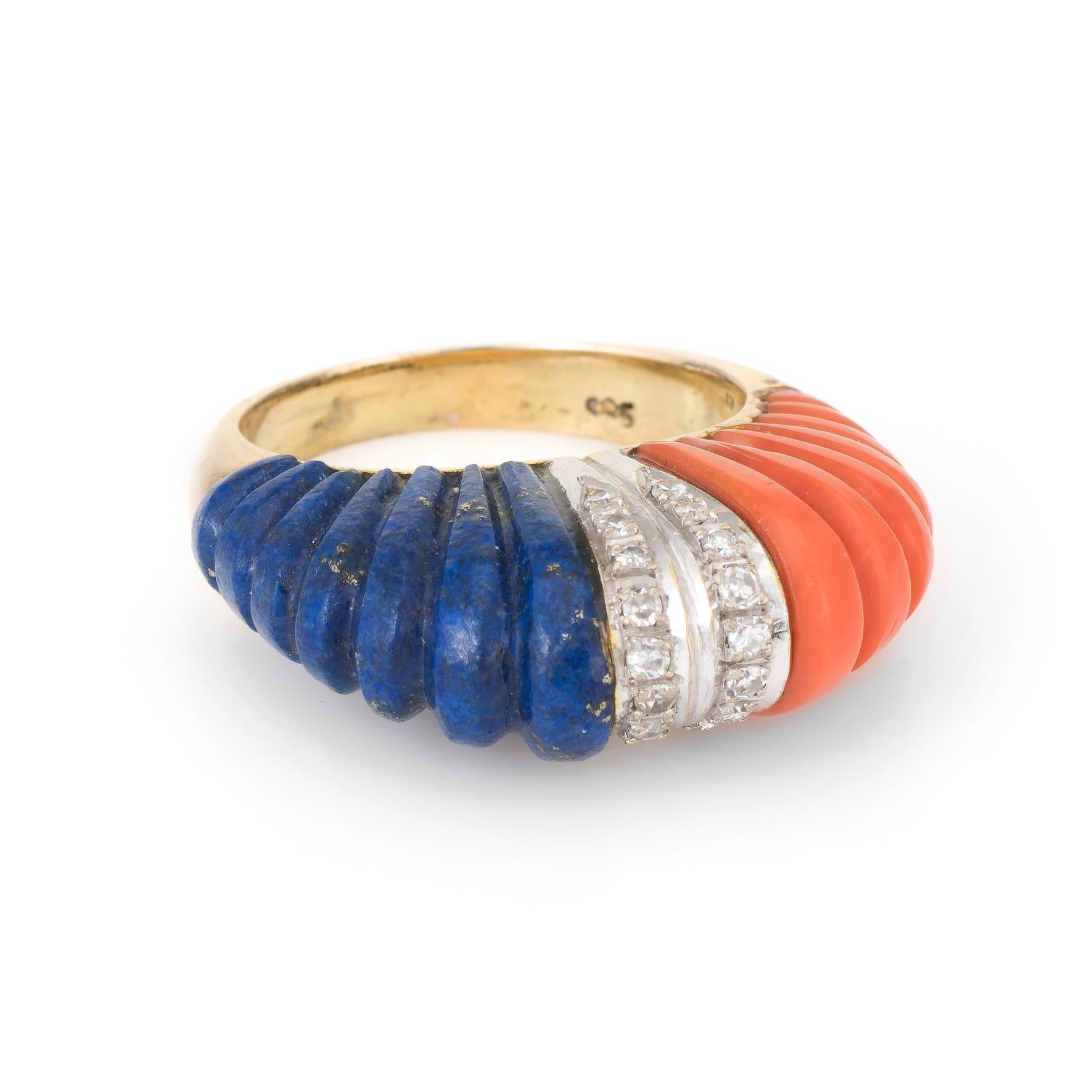 Finely detailed vintage dome cocktail ring (circa 1960s), crafted in 14 karat yellow gold. 

Fluted lapis lazuli measures 20mm x 7.5mm and fluted coral measures 20mm x 7.5mm. The lapis & coral is in excellent condition and free of cracks or chips.