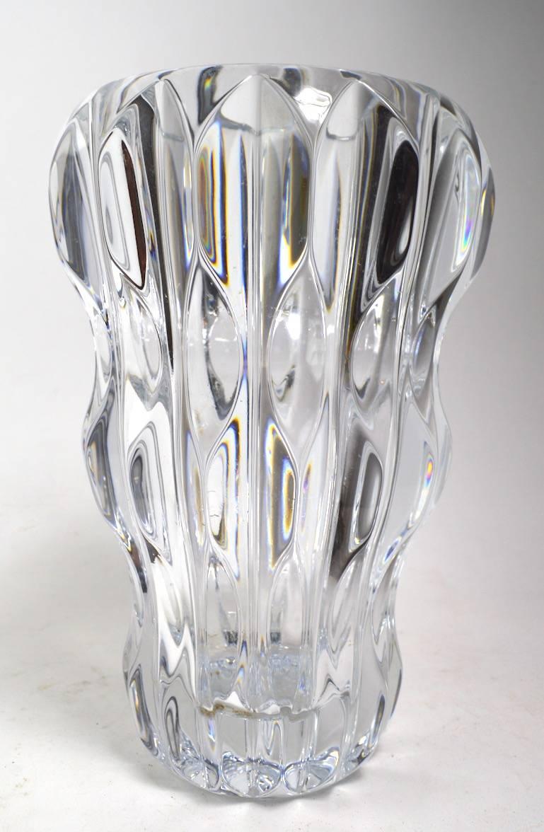 Stylish crystal vase after Baccarat. Art Deco / Mid-Century Modern period, high quality manufacture, and design. Perfect condition, free of chips, cracks, clouding etc. Unsigned.