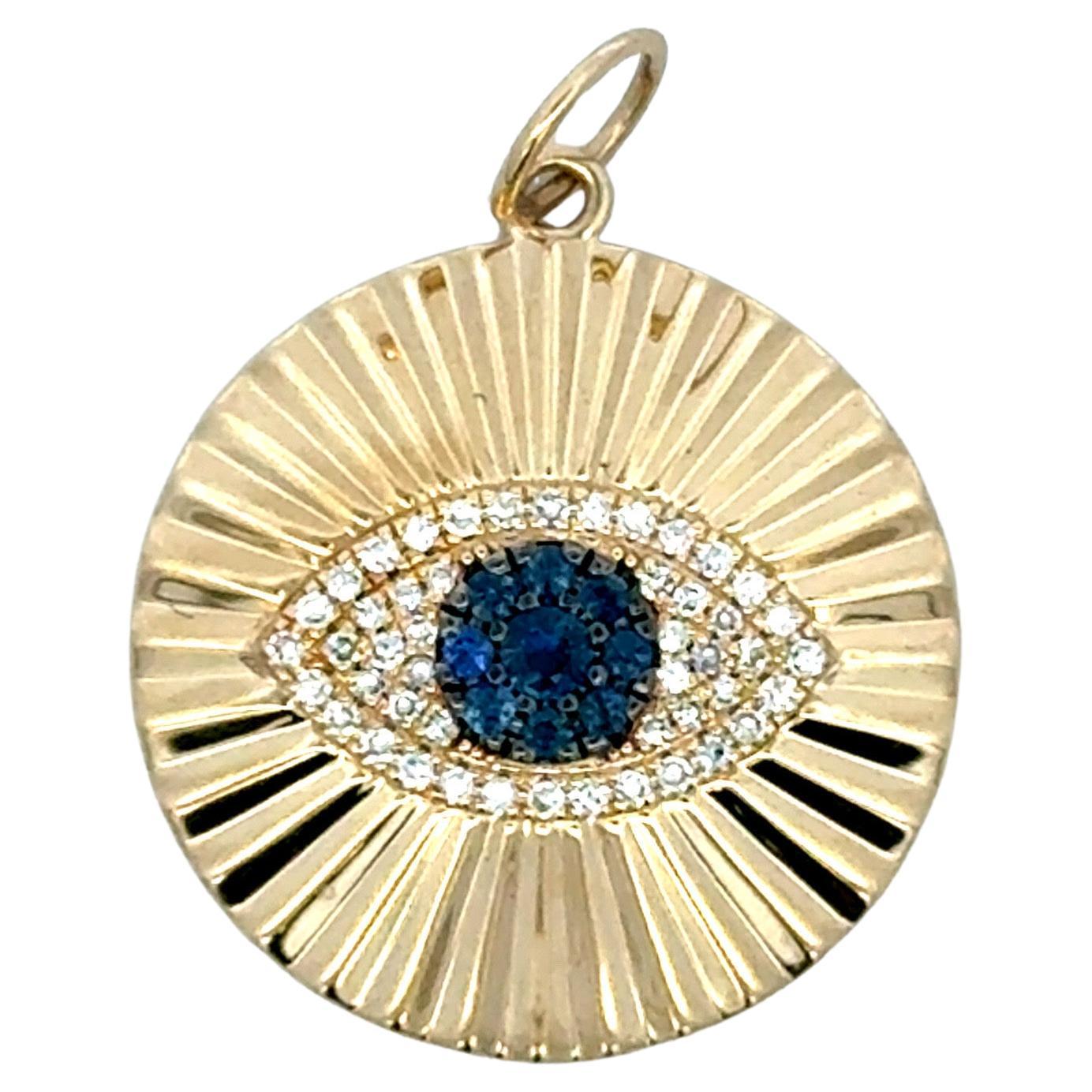 Pendentif or jaune 14 carats diamant saphir oeil du mal 2.2 grammes