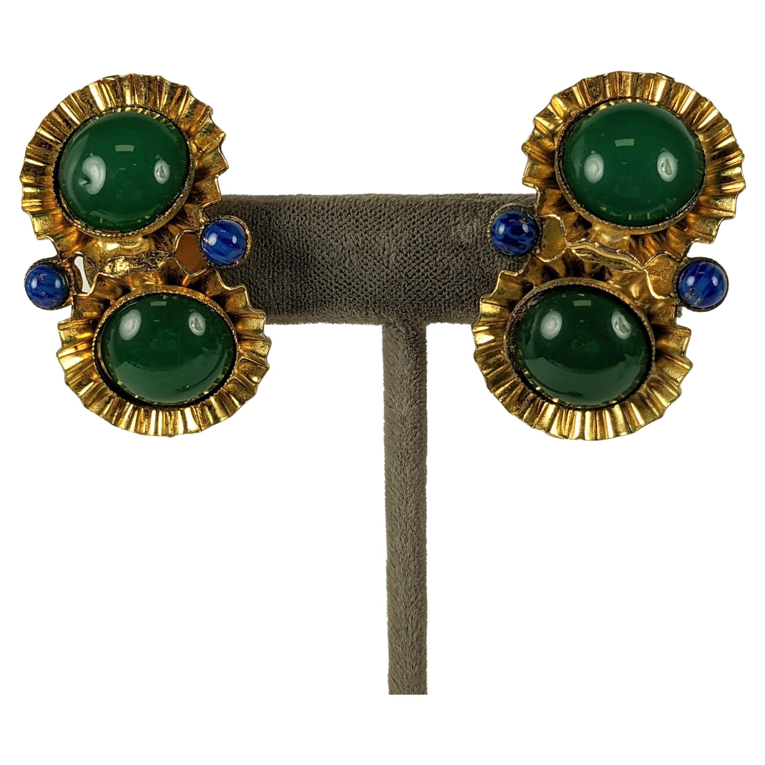 Attractive Fluted Gold and Green Cab Earrings from the 1960's made by William DeLillo. A pair of fluted gold discs gave faux green chalcedony cabs with faux lapis beads accents. 
Clip back fittings. Unsigned.  1.5
